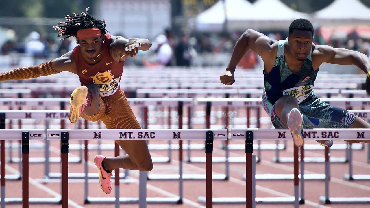 USC's Tade Ojora (right) running for Great Britain, wins the 110 Elite hurdles over teammate Johnnie Brackins in 13.38