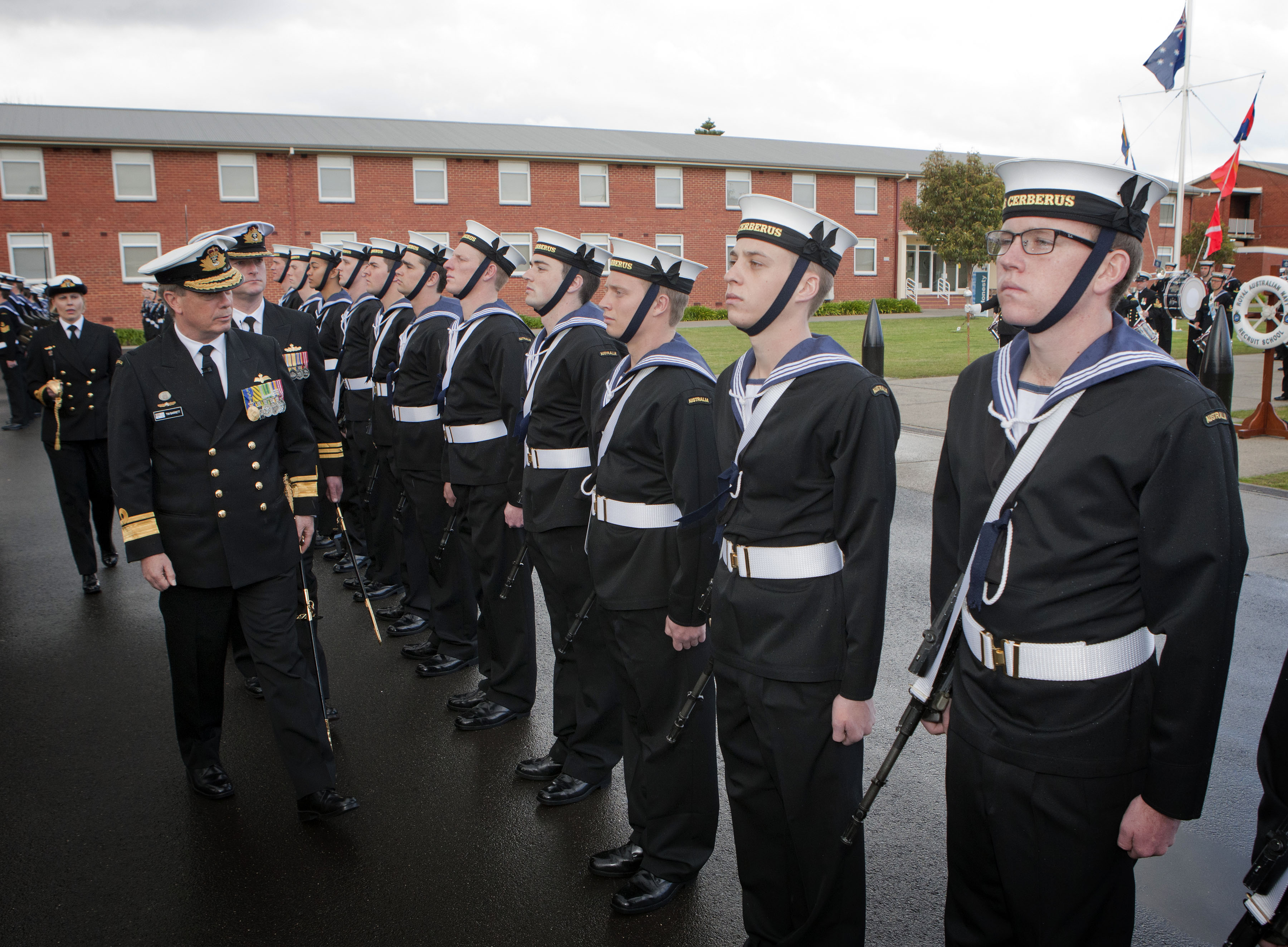 Reviewing Officer for the Graduation Parade, Rear Admiral Tim Barrett, AM, CSC, RAN inspects the graduating recruits of General Entry 314 Shipp Division. *** Local Caption *** The Graduation Parade for General Entry 314, the first Shipp Division, was held on the Recruit School Parade Ground on Fri 30 Aug 2013. 80 Recruits graduated in front of family and friends. The Reviewing Officer for the Graduation Parade was Rear Admiral Tim Barrett, AM, CSC, RAN. Two Bell 429 Helicopters from 723SQN and three S-70B-2 Seahawk Helicopters from 817SQN provided a fly-past as a tribute to the links between Shipp Division and the Fleet Air Arm. Shipp Division is named in honour of Leading Seaman Aircrewman Noel Ervin Shipp, who served in Vietnam with the Second Contingent of the Royal Australian Navy Helicopter Flight in September 1968 and died while engaging the enemy under heavy fire.