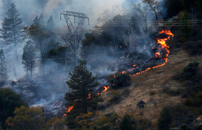 The deadly 2018 Camp Fire burns around PG&E transmission towers east of Pulga, near the source of the first report of the fire.