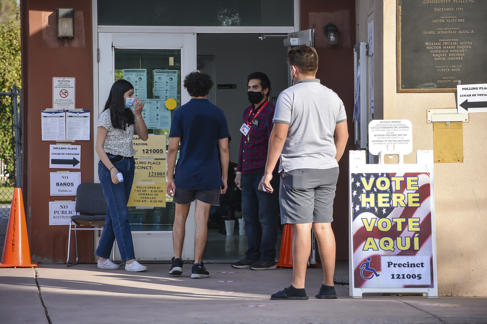 Poll workers and members of the public can be seen near the entrance to the polling site at the Mario Esquer Building in Calexico on Nov. 3, 2020. Photo by CORISSA IBARRA, Calexico Chronicle (CM use only)