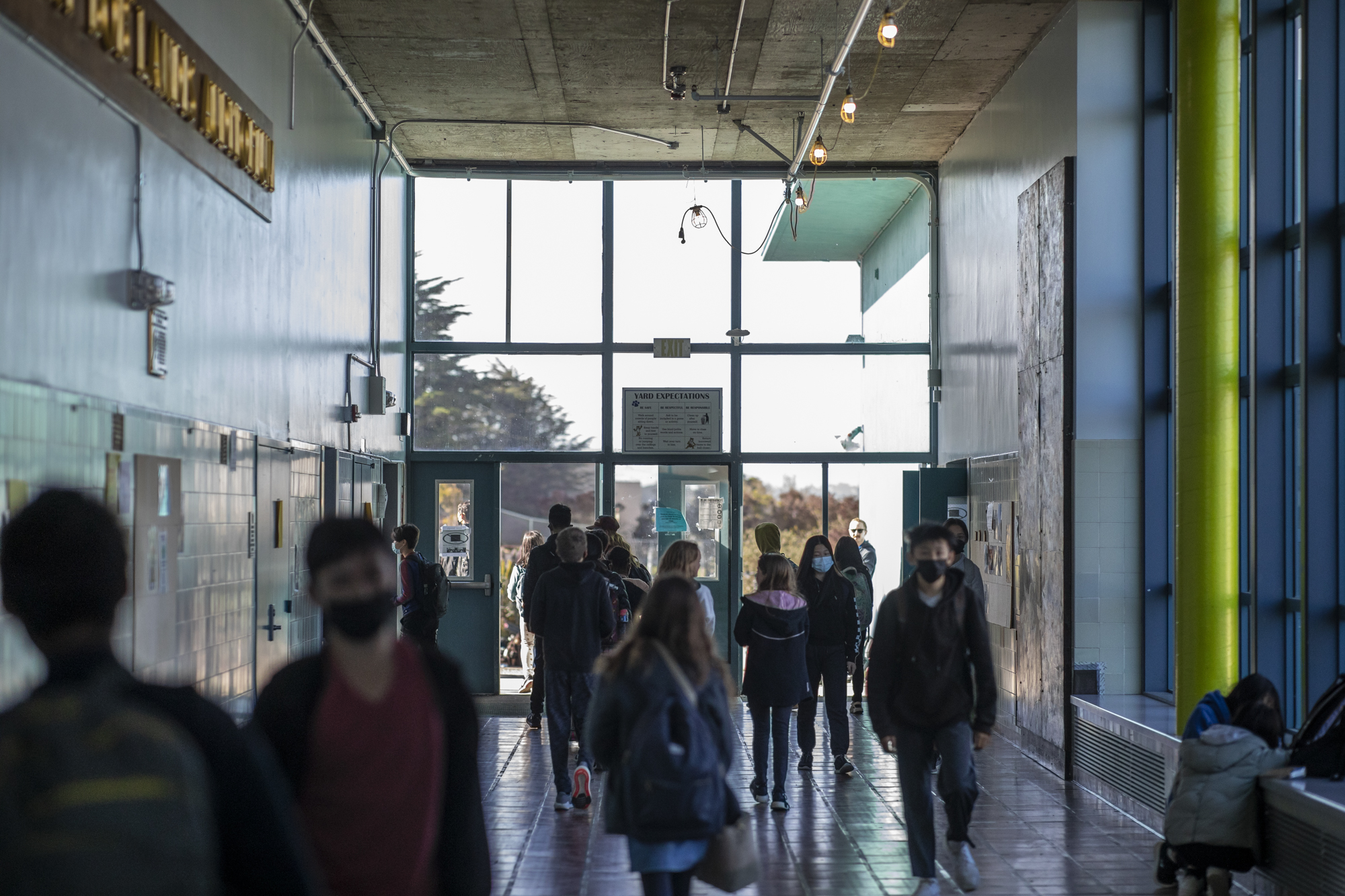 Students walk in the hallways at AP Gianni Middle School in San Francisco on April 22, 2022