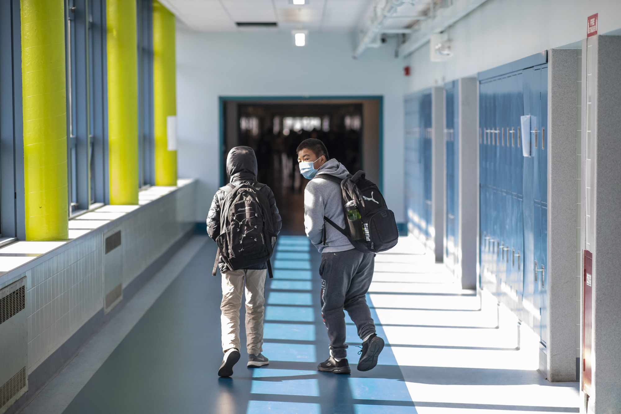 Students walk in the hallways at AP Gianni Middle School in San Francisco on April 22, 2022. Photo by Martin do Nascimento, CalMatters