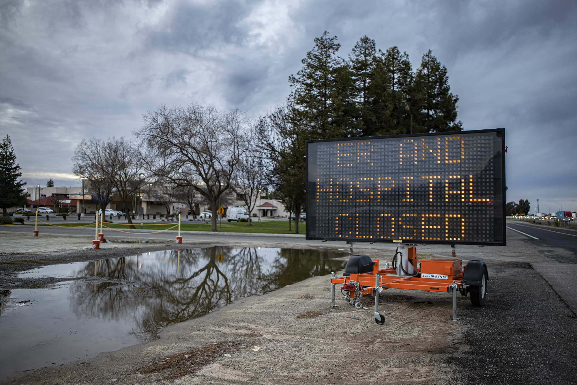 A road sign announcing the closure of the Emergency Room and Madera Community Hospital outside the main entrance on Jan. 2, 2023. 