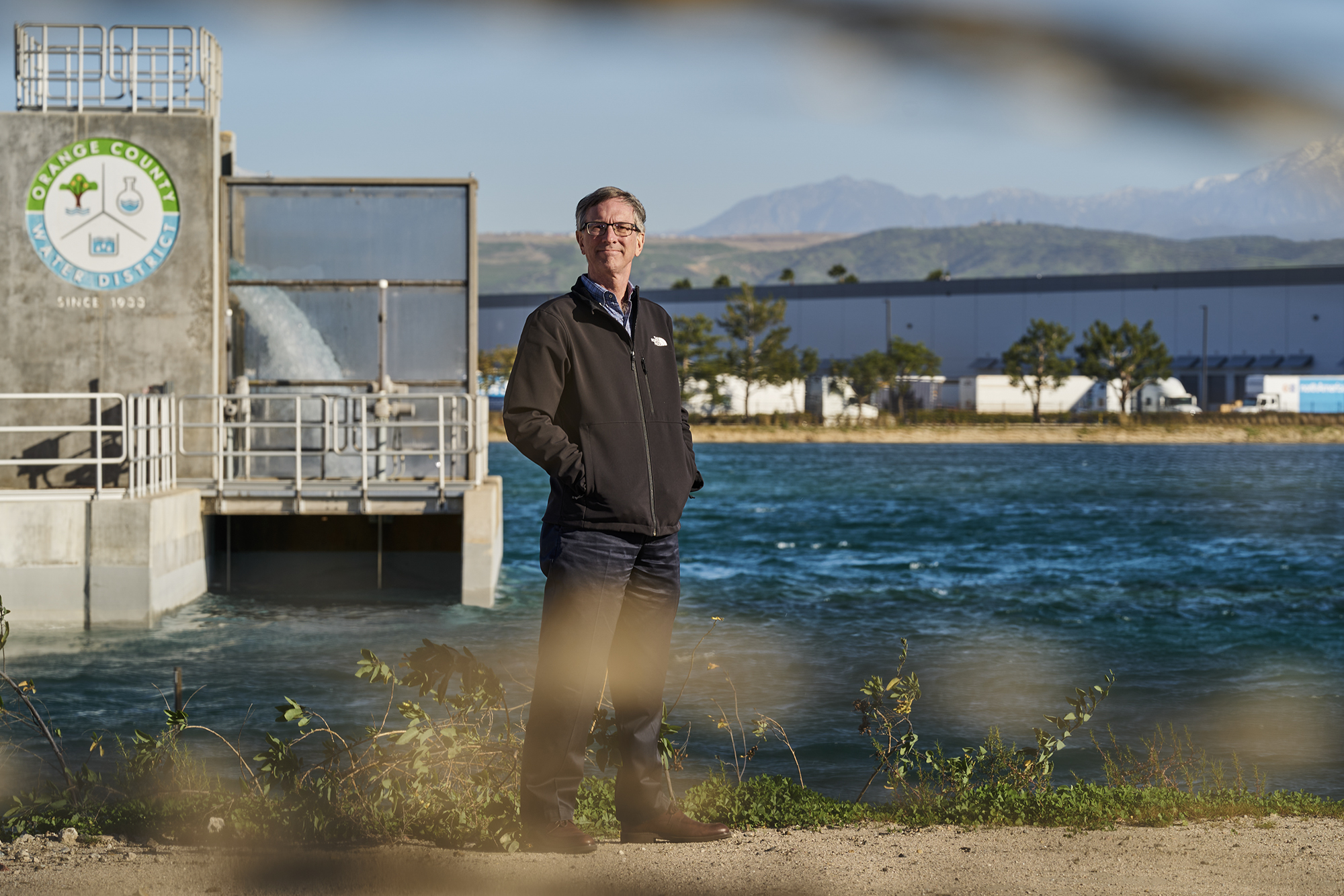 Roy Herndon, chief hydrogeologist at the Orange County Water District, poses for a portrait at the La Palma Recharge Basin in Anaheim on Jan. 26, 2023.
