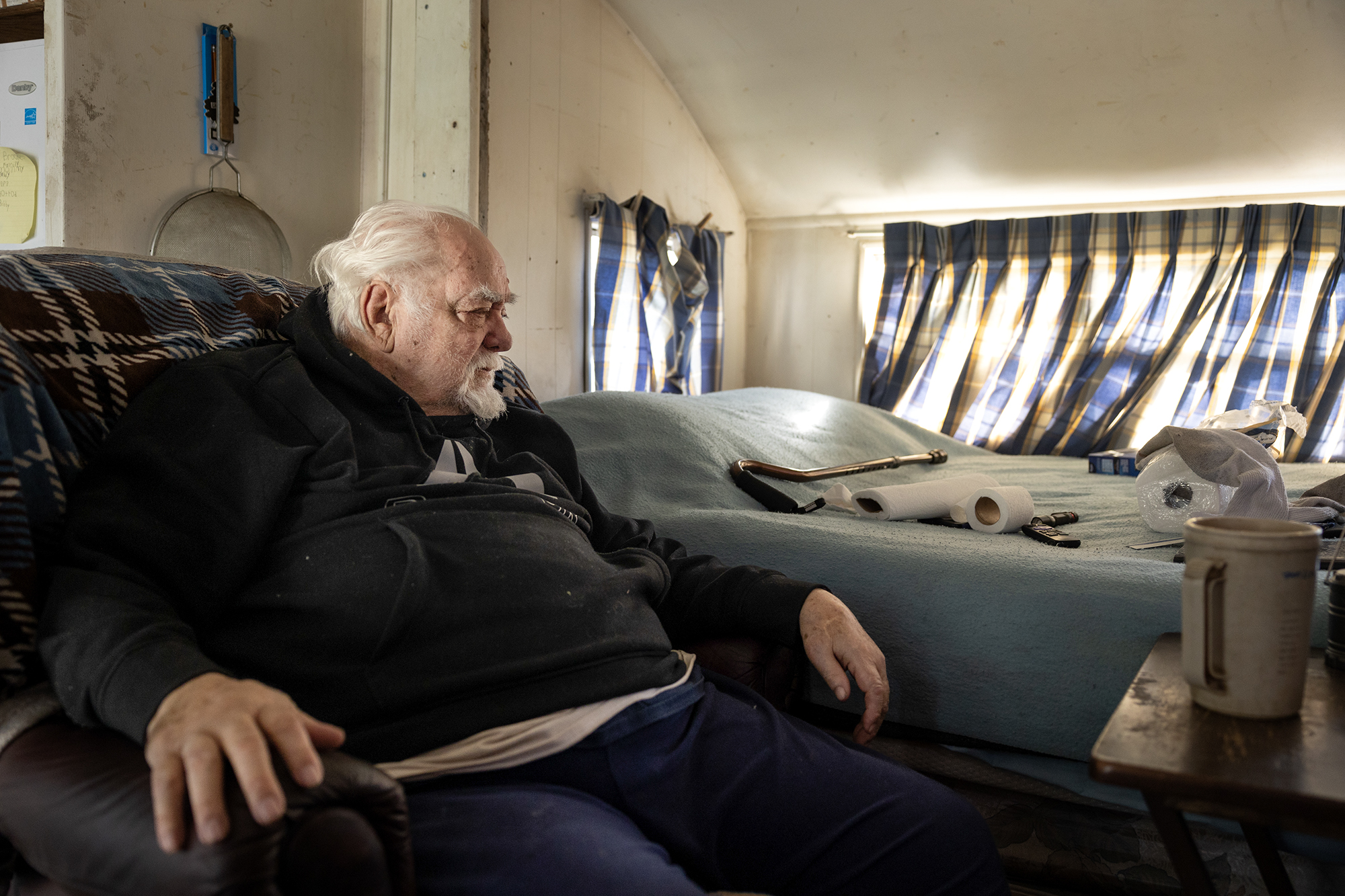 Bobby Riley, 87, at his home at Stockton Park Village in Stockton on Jan. 27, 2023. Riley has been using a generator for electricity and relying on bottled water, as his park currently doesn't provide those services.
