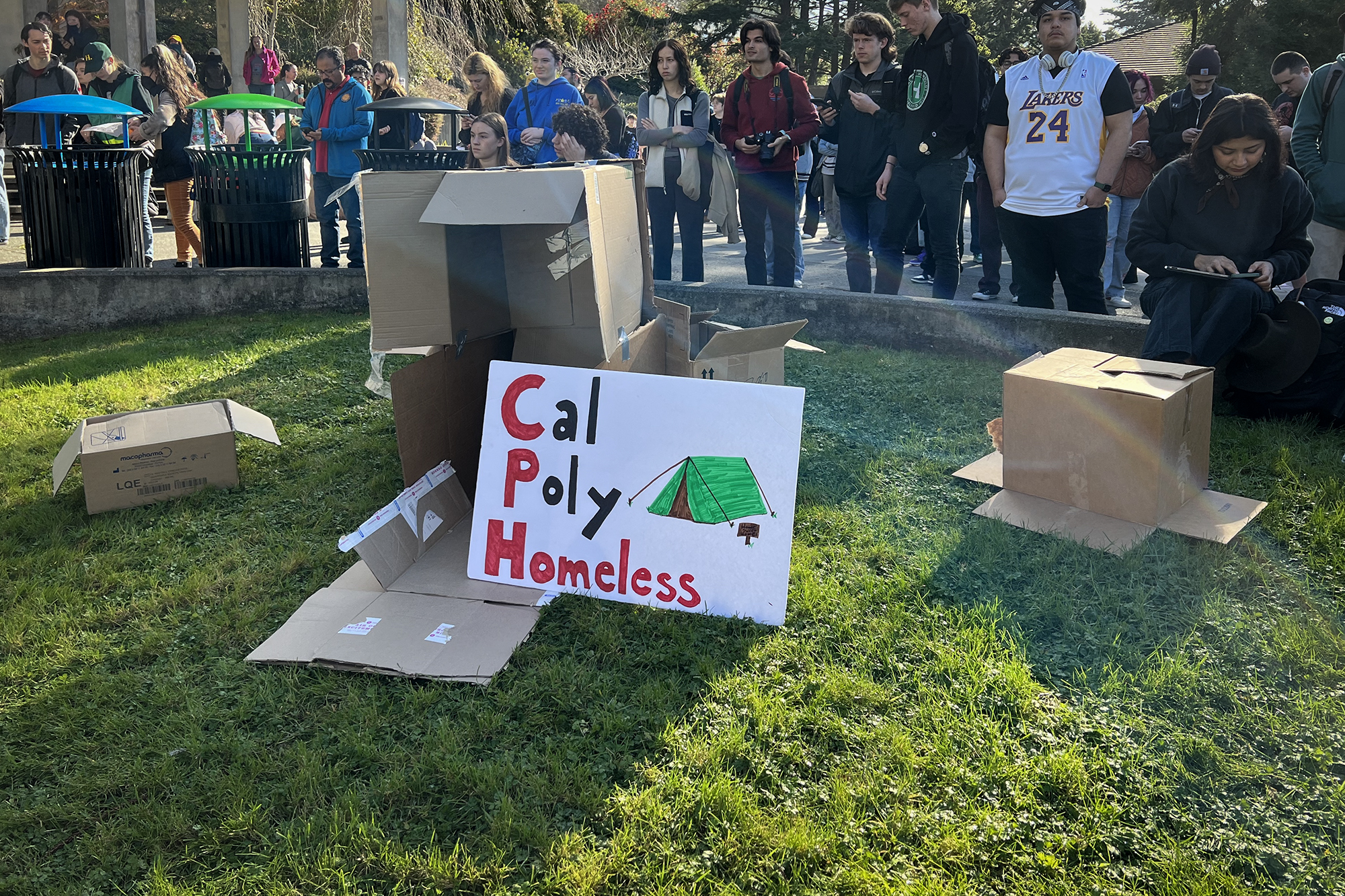 Cal Poly Homeless, a student-run organization that formed in response to recent housing policy changes at Cal Poly Humboldt, displays cardboard boxes on the campus quad as a representation of student homelessness, on Feb. 8, 2023.