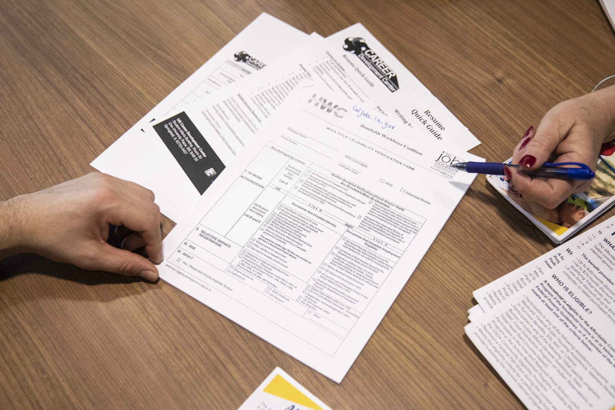 Leann Greene helps guide cannabis workers seeking job opportunities outside of the cannabis industry through a program with the Humboldt Workforce Coalition at the Humboldt County Library in Garberville on Feb. 8, 2023. Photo by Martin do Nascimento, CalMatters