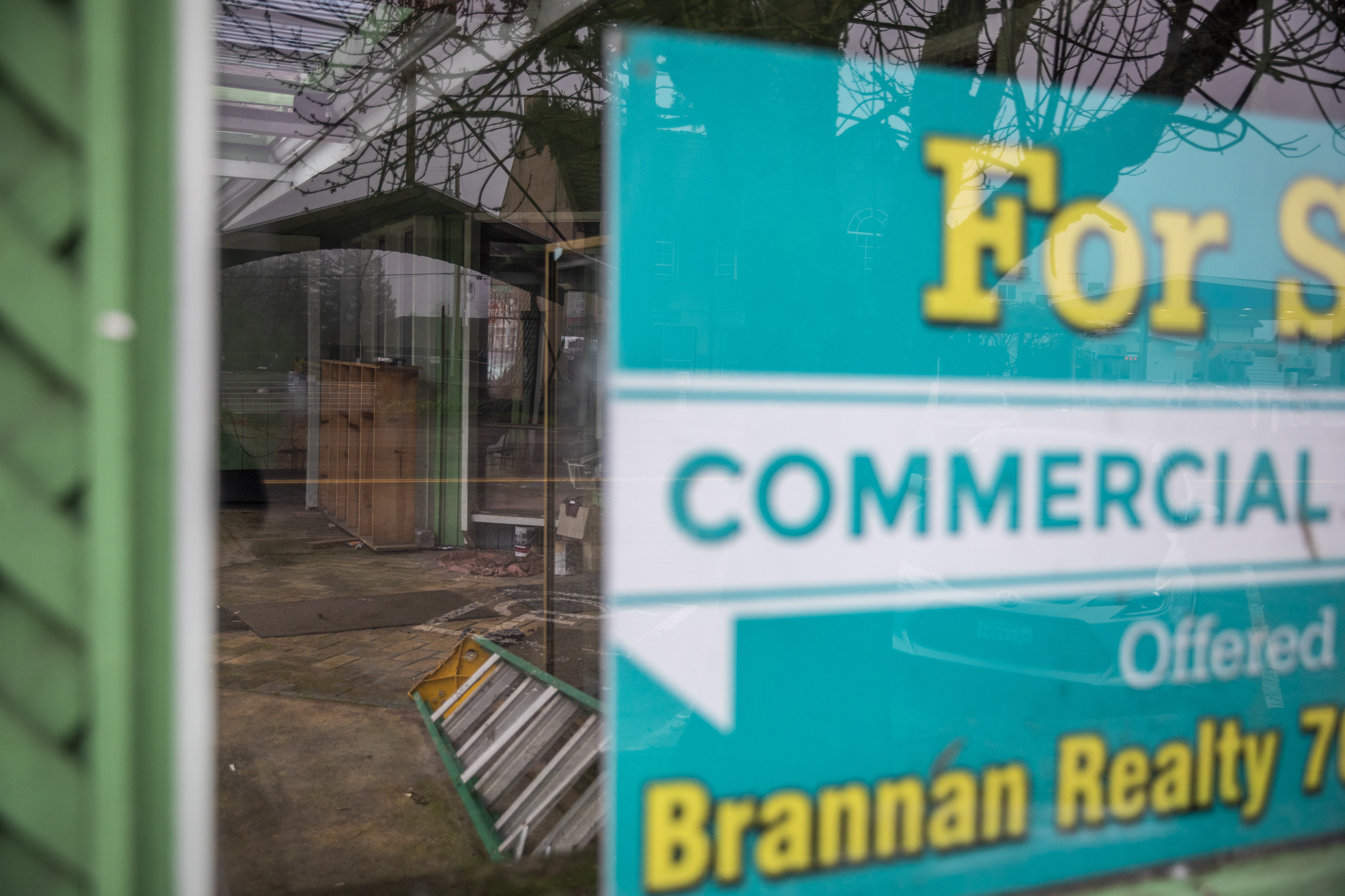 A "For Sale" sign in the window at Hemp Connection in Garberville on Feb. 9, 2023.