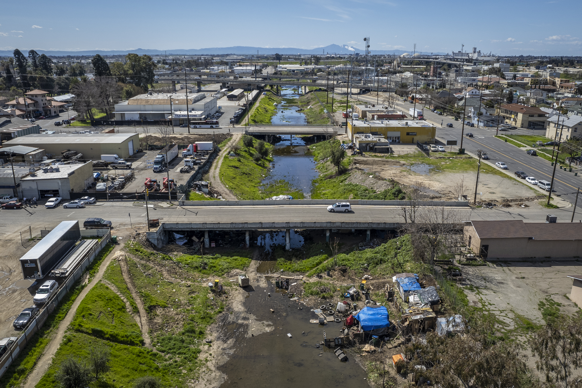 Mormon Slough near downtown Stockton on March 24, 2023. Photo by Martin do Nascimento, CalMatters