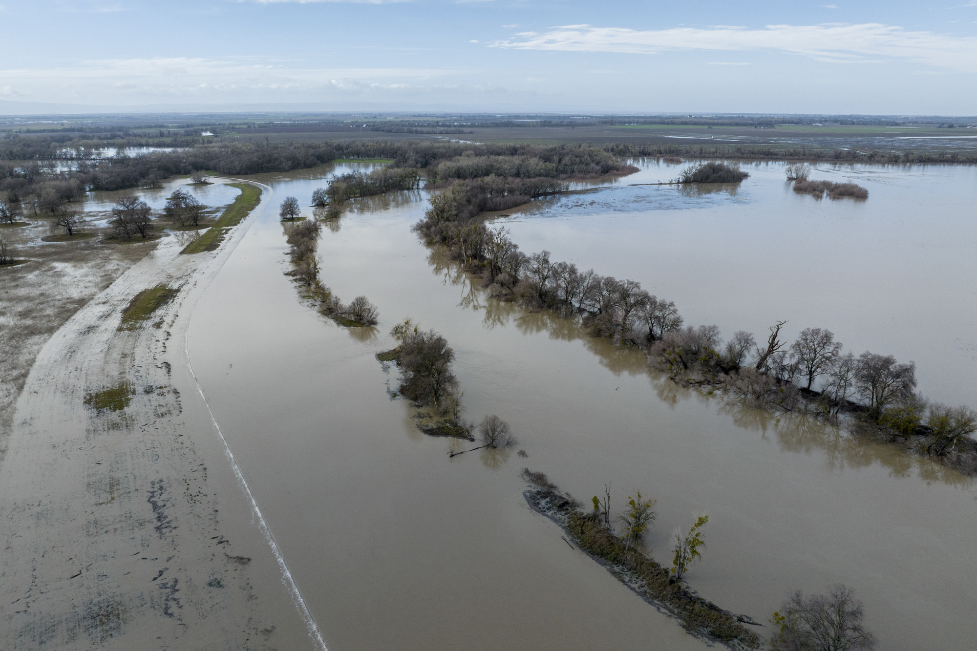 Fremont Weir along the Sacramento River overtopping in Knights Landing on Jan. 9, 2023. Fremont Weir Wildlife Area is 1,461 acres at the north end of the Yolo Bypass floodway along the Sacramento River in Sutter County and Yolo County.