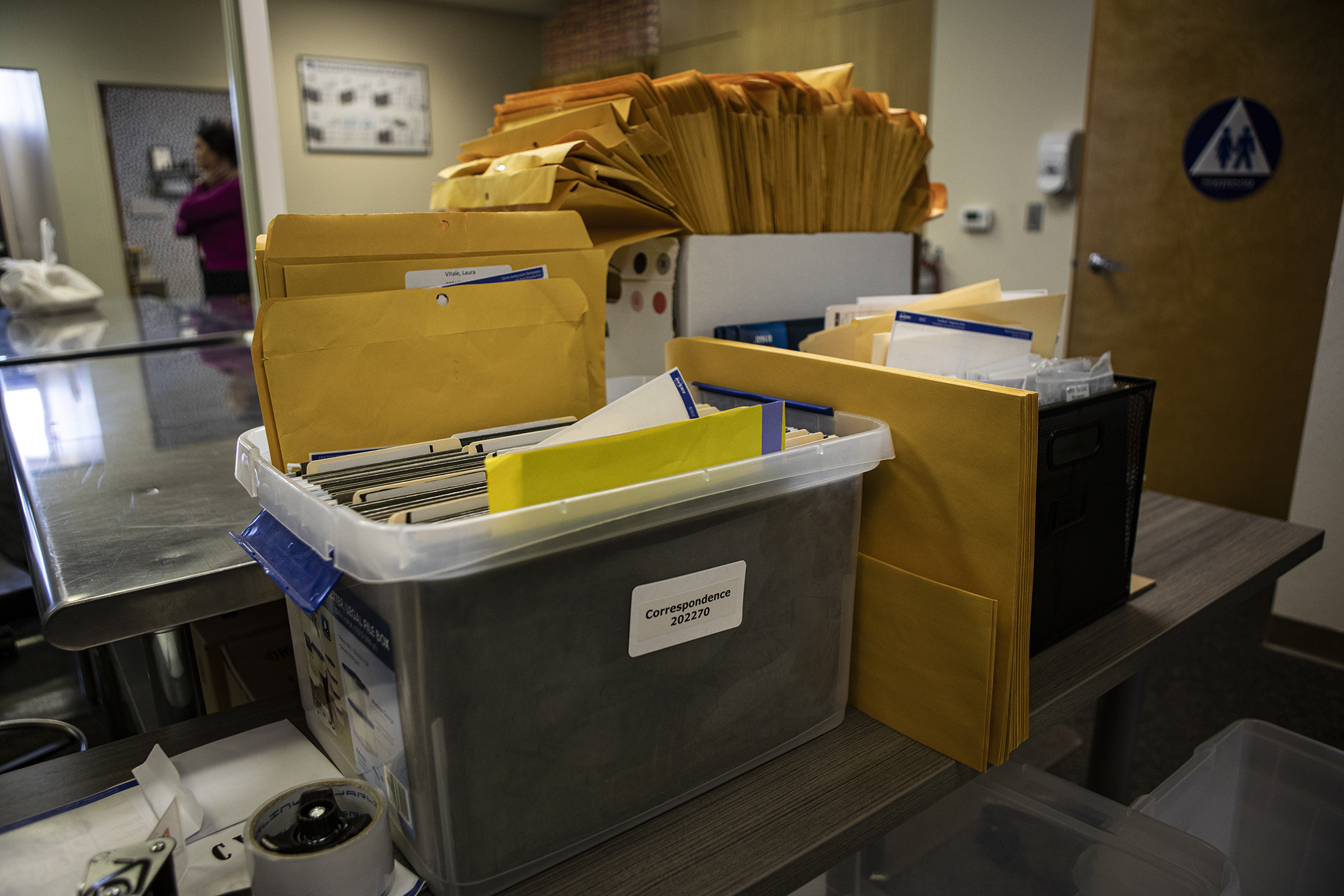 Correspondence letters from inmate students in the Cerro Coso office in Tehachapi on May 10, 2023. Photo by Larry Valenzuela, CalMatters/CatchLight Local