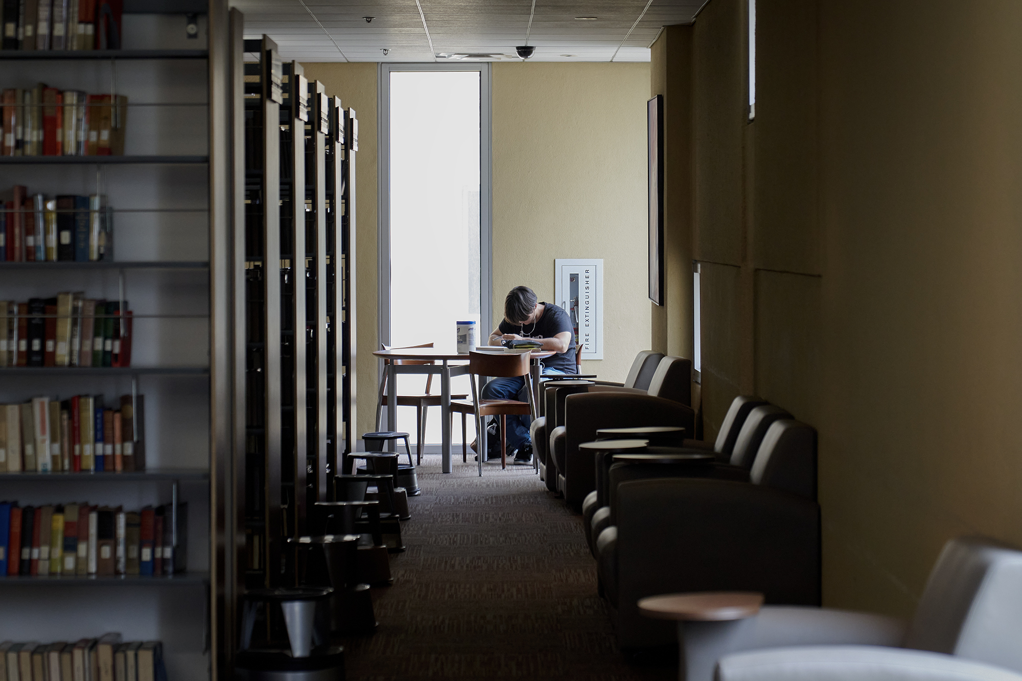 A student studies in the library at San Bernardino Valley College on May 30, 2023. 