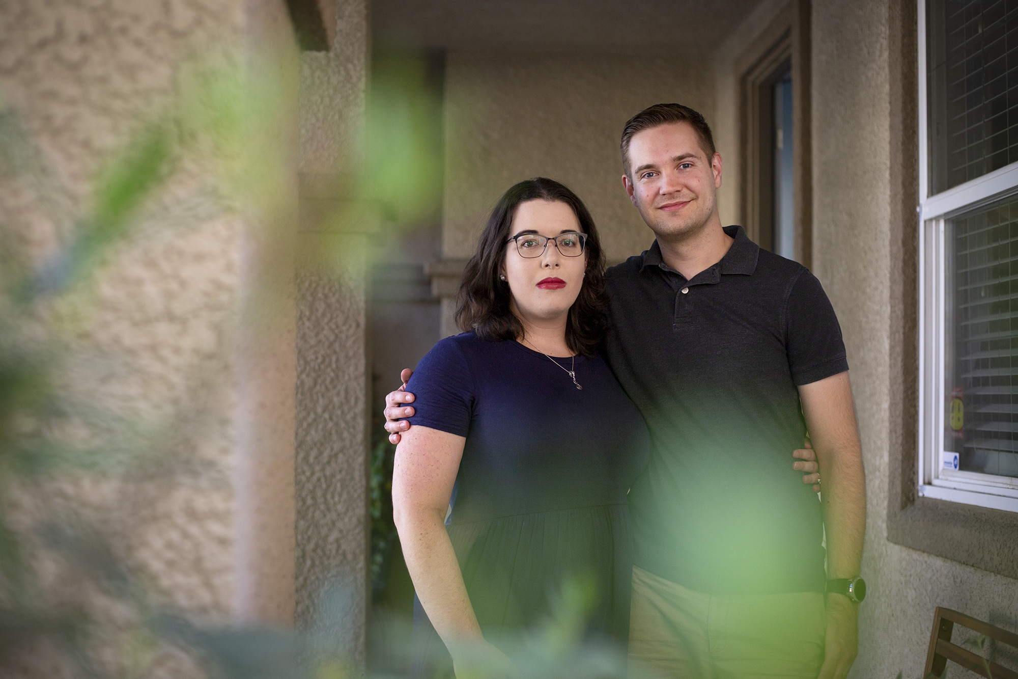 Kelsey McQuaid-Craig and her husband Brandon J. Craig at their home in Sacramento on Aug. 8, 2022. Photo by Miguel Gutierrez Jr., CalMatters