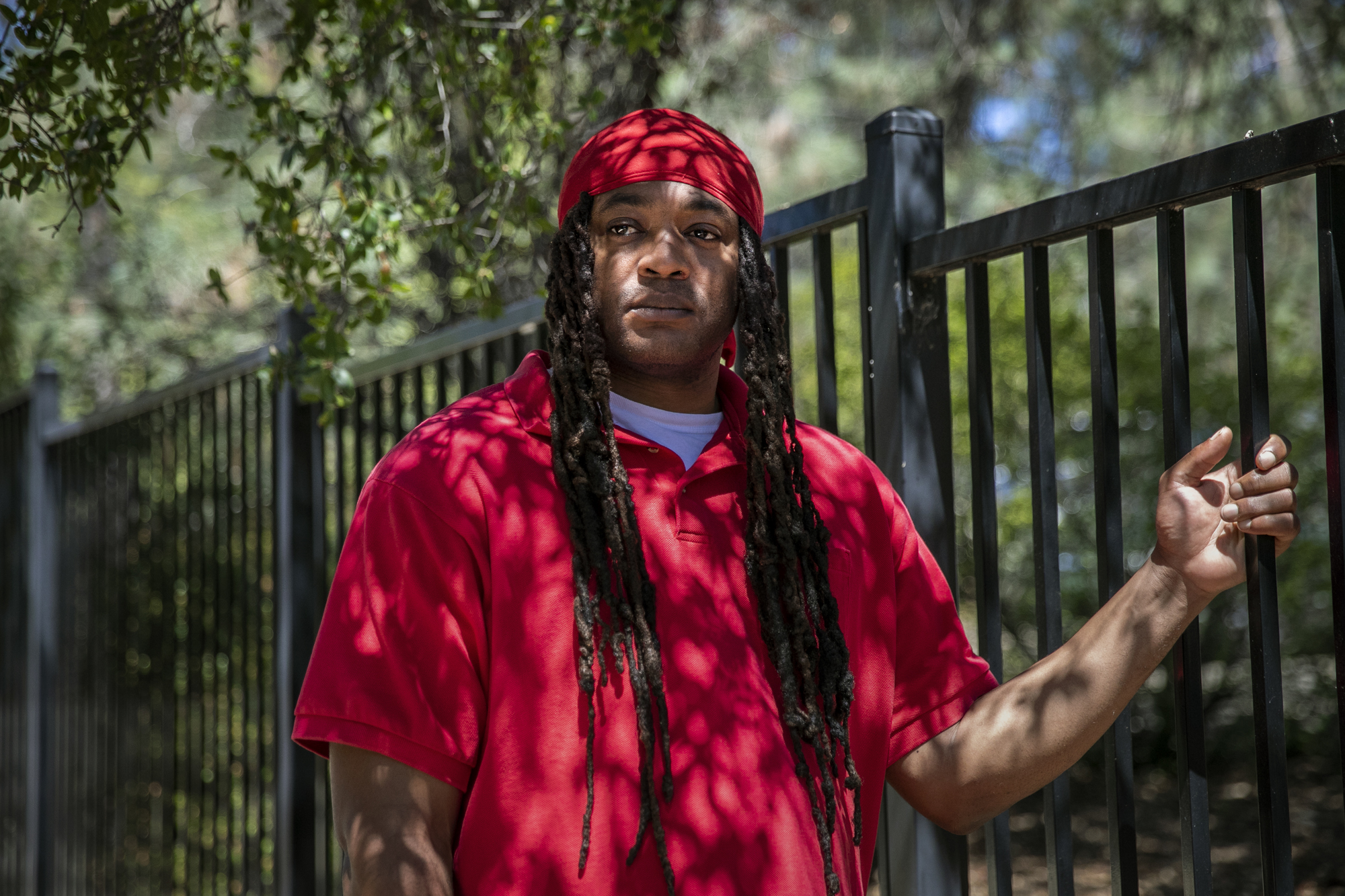 Lorenzo Mays poses for a photo outside the halfway house where he lives in Shingle Springs on Aug, 10, 2022.