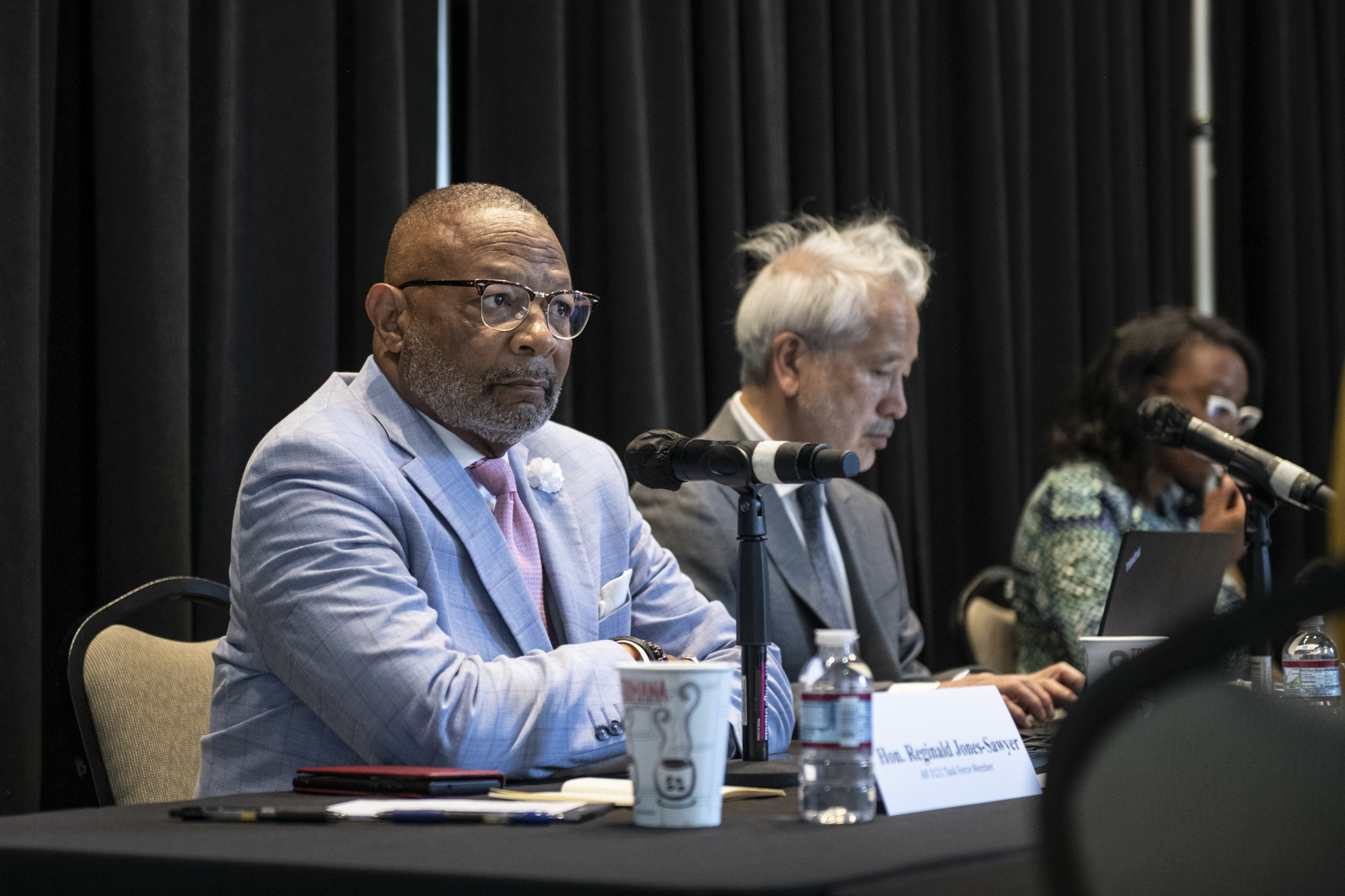 Assemblyman Reginald Jones-Sawyer and member of the California Reparations Task Force listens to public comment during a public meeting at the California Science Center in Los Angeles on Sept. 23, 2022. Photo by Pablo Unzueta for CalMatters