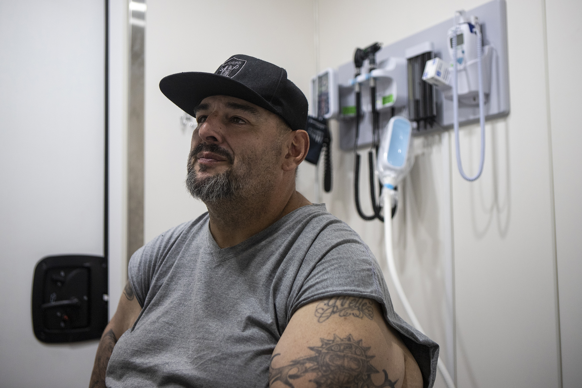 Patient Isaac Pierce gets a check-up in the Los Angeles County Department of Health Services mobile clinic parked in Whittier Narrows Park on Nov. 17, 2022.