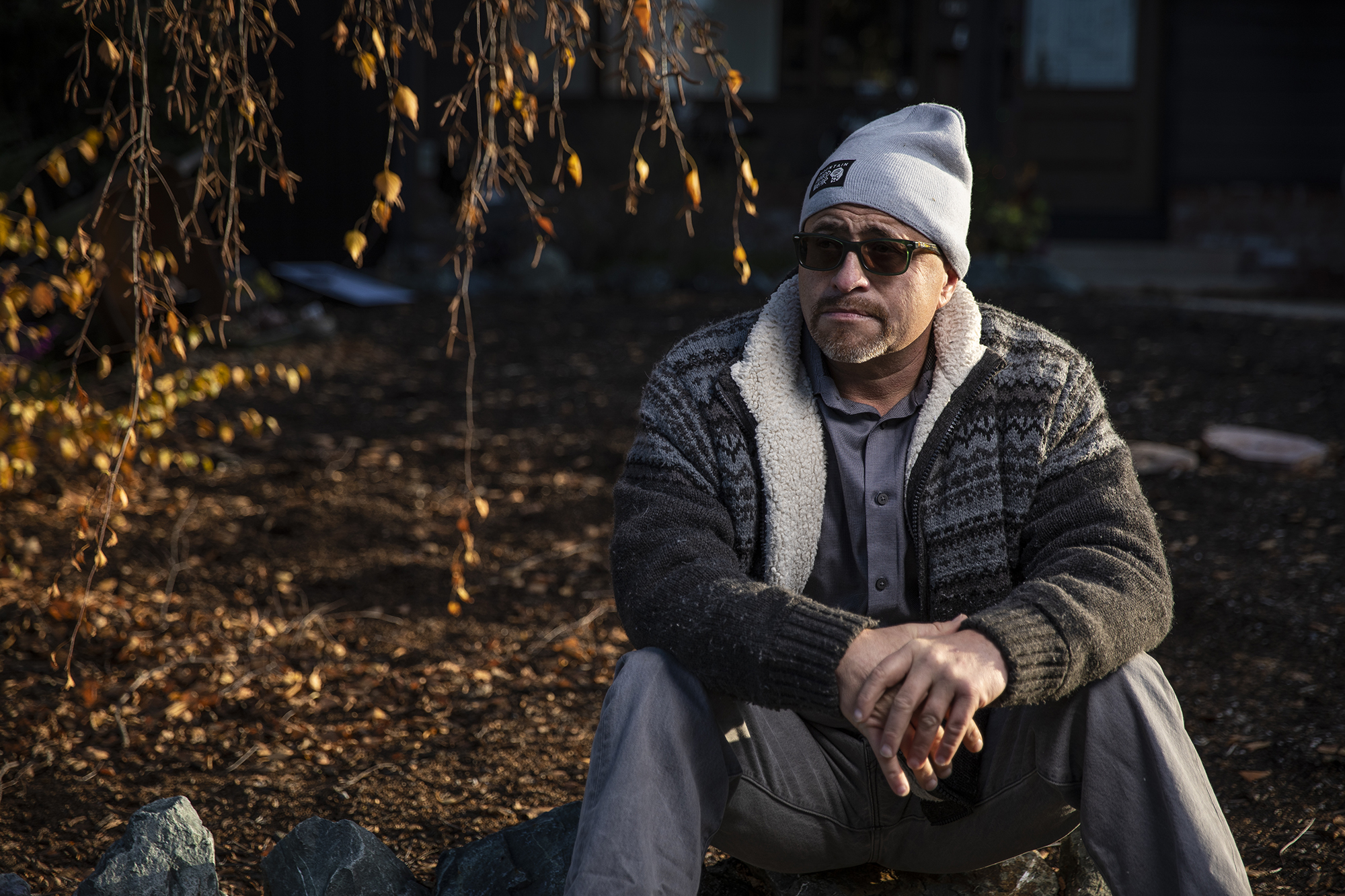 Joe Calderon, a former Transitions Clinic Network patient and lead community health worker with the group outside his home in San Pablo on Dec. 23, 2022