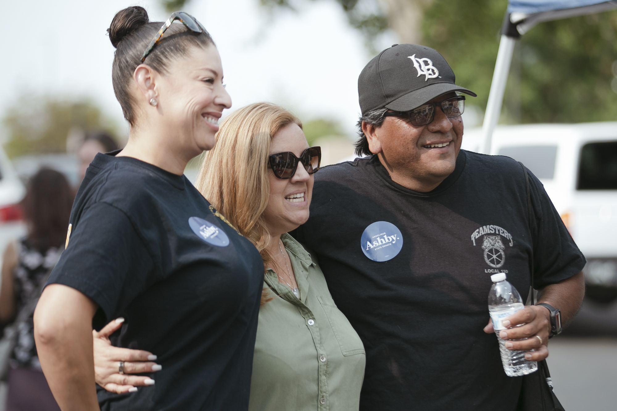Angelique Ashby, a state Senate candidate in the 2022 California election, greets supporters at a campaign event in Sacramento on Sept. 10, 2022. Photo by Rahul Lal, CalMatters