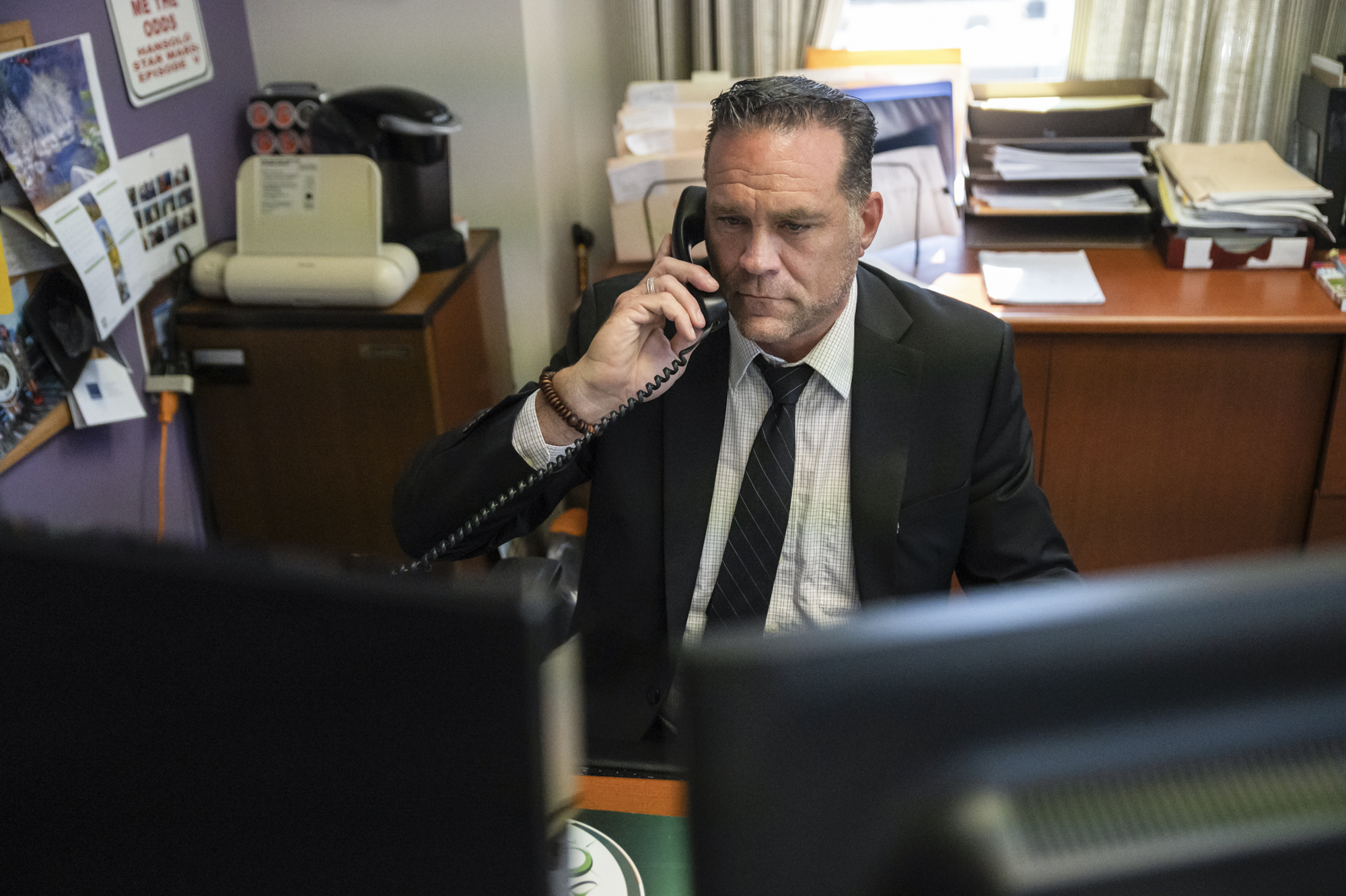 Jeffrey Brooker, the San Diego Supervising Deputy City Attorney, works in his office in San Diego on July 13, 2022. Photo by Raquel Natalicchio for CalMatters