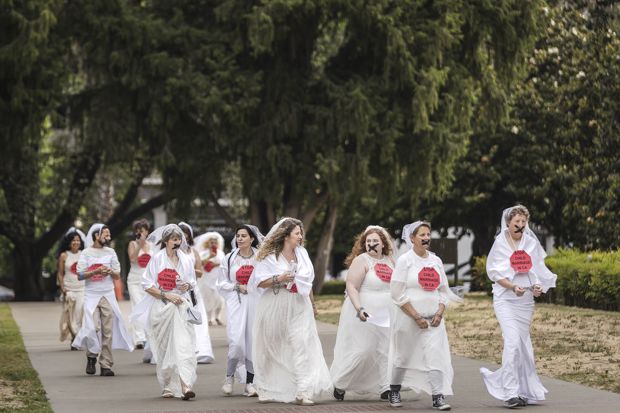 Forced and child marriage survivors arrive at a protest, organized to support a ban on child marriage, at the state Capitol in Sacramento on June 22, 2023. Photo by Rahul Lal, CalMatters