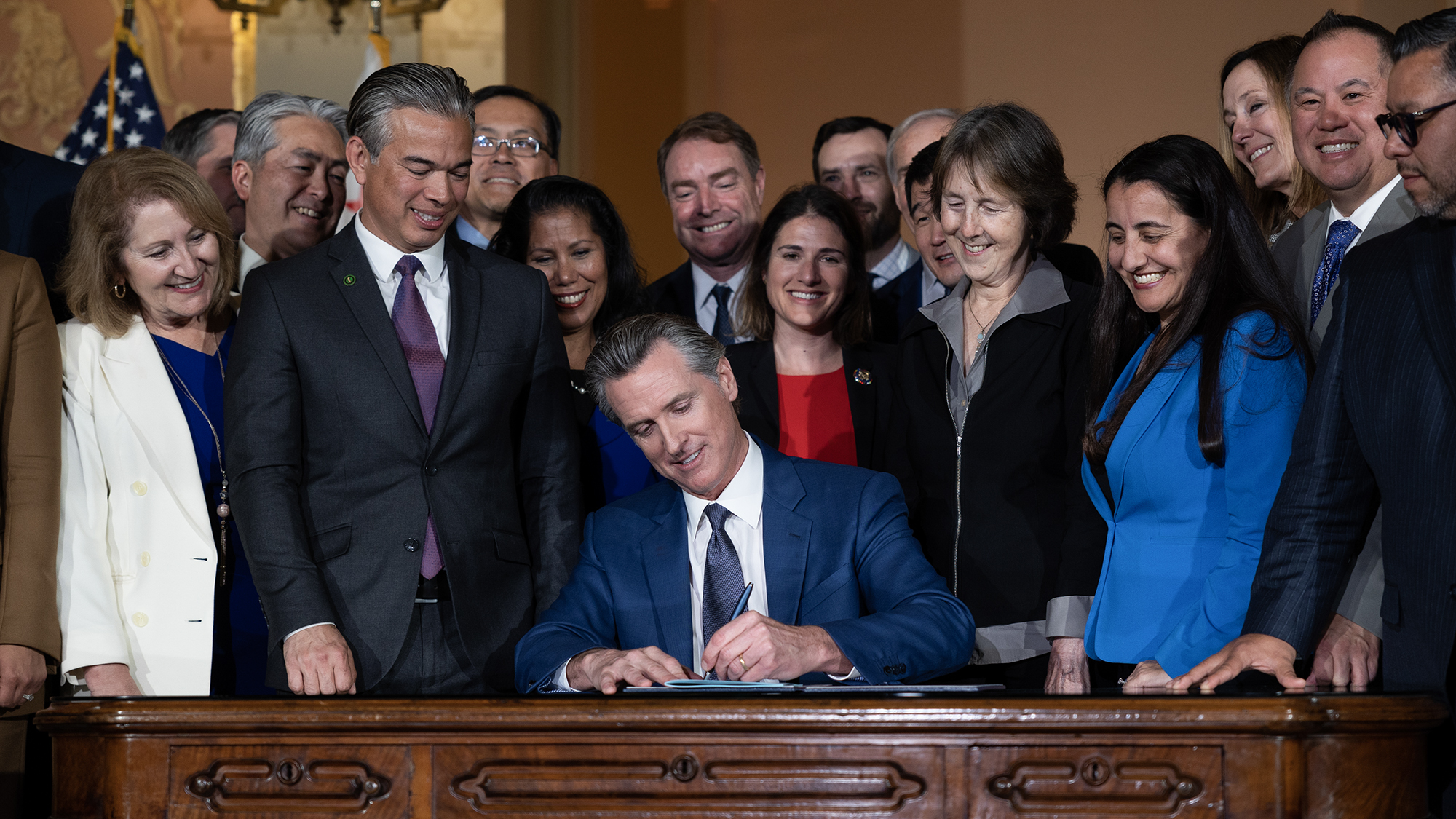 Which bills did Gavin Newsom sign into new California laws?