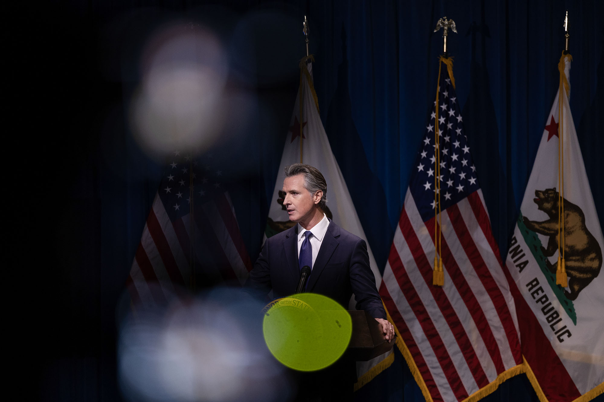 Gov. Gavin Newsom addresses the media during a press conference unveiling his 2024-25 January budget proposal at the Secretary of State Auditorium in Sacramento on Jan. 10, 2024. Photo by Miguel Gutierrez Jr., CalMatters