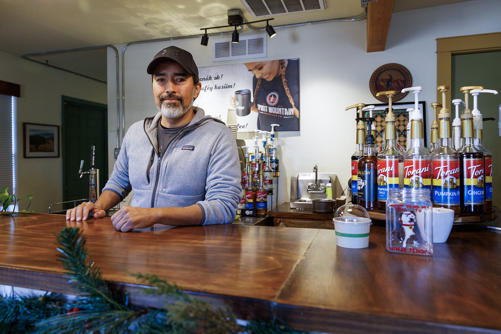 Tudor Montague, a Quechan community member, at his coffee shop, Spirit Mountain Roasting Co., in Winterhaven on Dec. 12, 2023. Montague, who grew up in the area, opened the coffee shop in June of 2023. Photo by Kristian Carreon for CalMatters