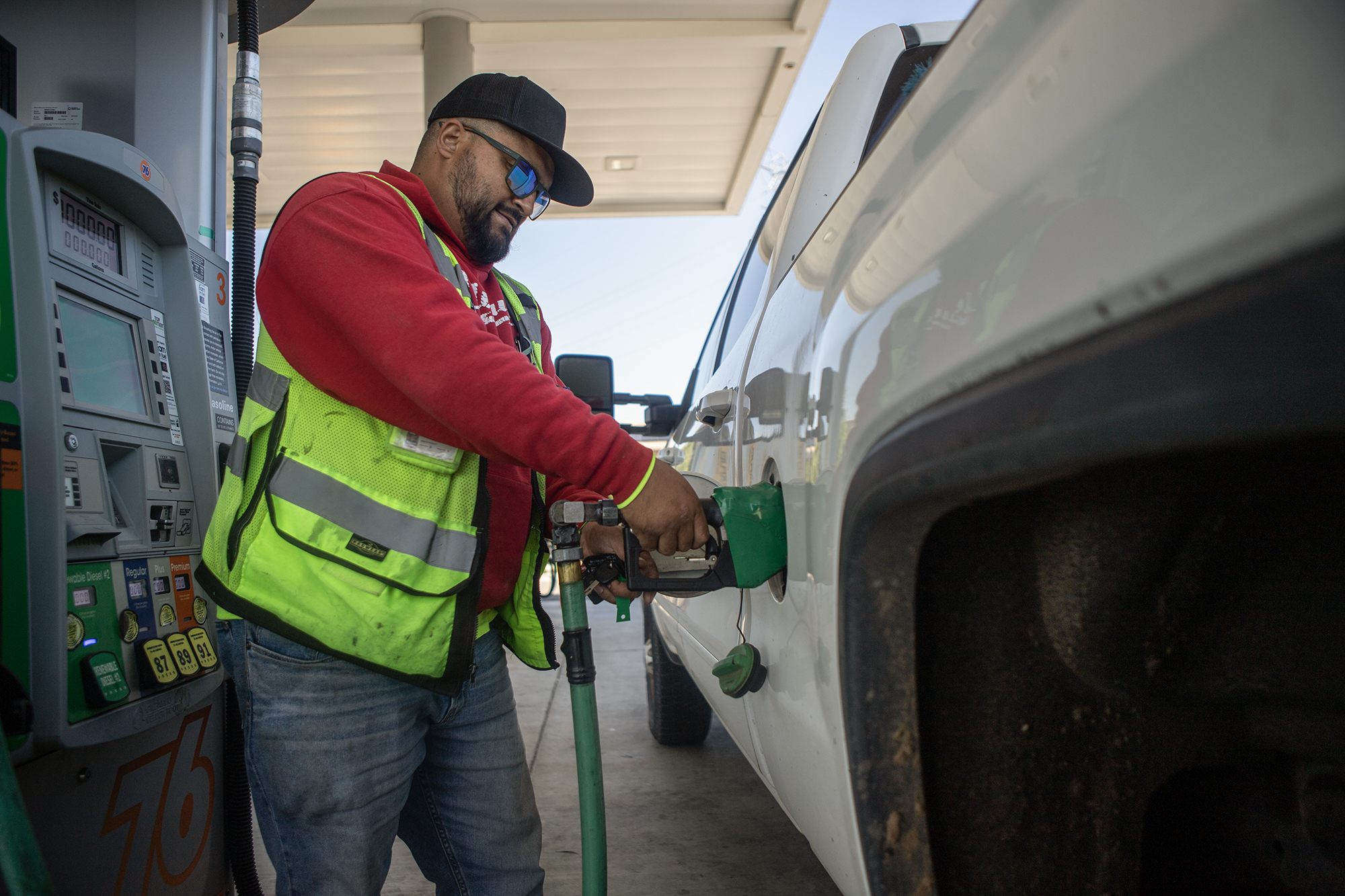 Adrian De La Cruz fills his work truck with diesel gas at a filling station in west Fresno on May 7, 2024. Photo by Larry Valenzuela, CalMatters/CatchLight Local