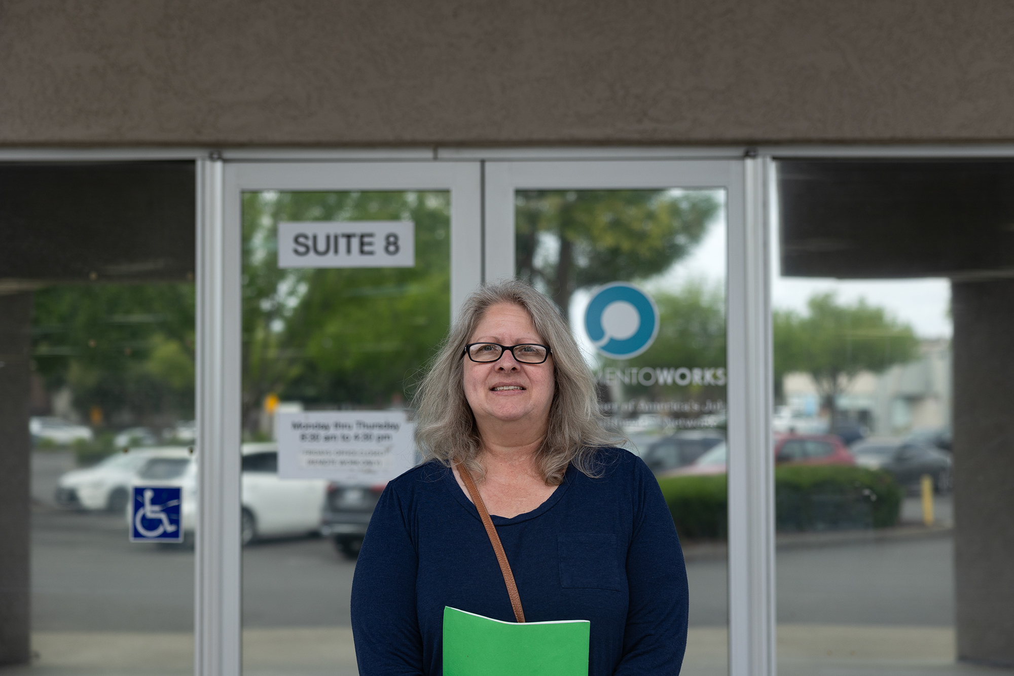 Lisa Peterson outside of the Sacramento Works job training and resources center in Sacramento on April 23, 2024. Photo by Miguel Gutierrez Jr., CalMatters