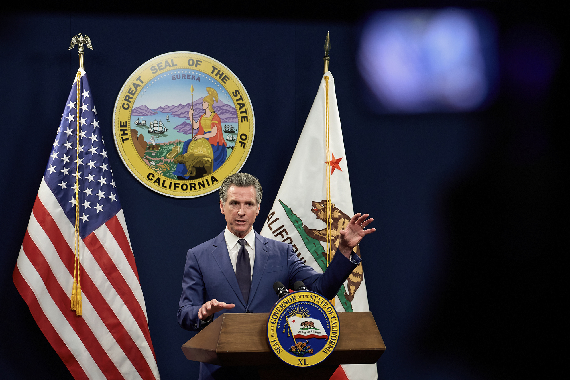 Gov. Gavin Newsom addresses the media during a press conference unveiling his revised 2024-25 budget proposal at the Capitol Annex Swing Space in Sacramento on May 10, 2024. Photo by Fred Greaves for CalMatters