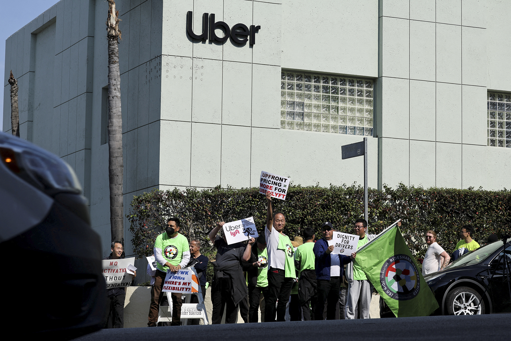 Uber, Lyft, and DoorDash drivers strike during what they call "A National Day of Action" to protest fair pay and treatment by their rideshare companies in Los Angeles on Feb. 14, 2024. Photo by Mike Blake, Reuters