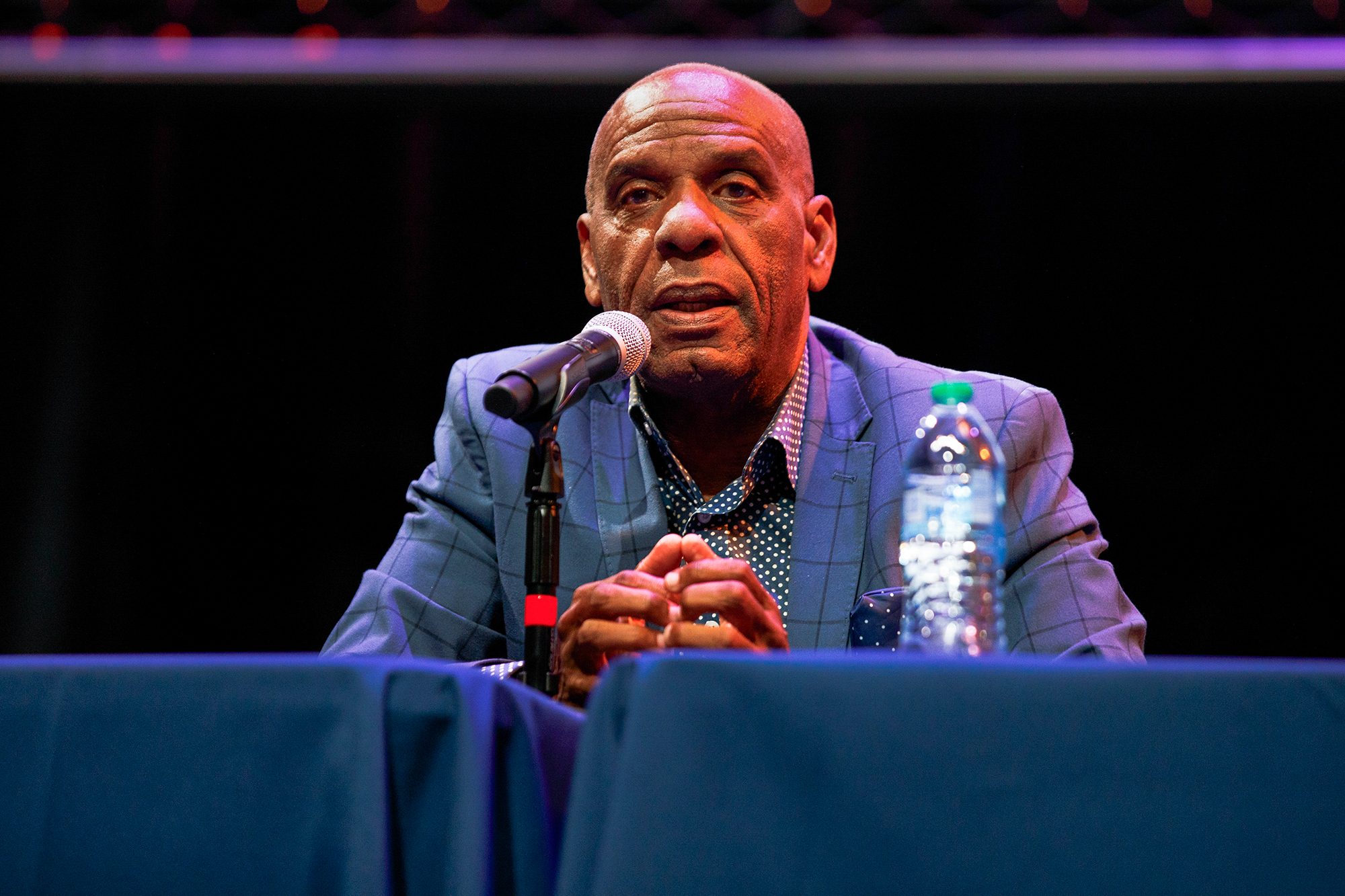 State Sen. Steven Bradford speaks during a Q-and-A session at the State of Black California Tour at Crawford High School in San Diego on June 15, 2024. Photo by Kristian Carreon for CalMatters