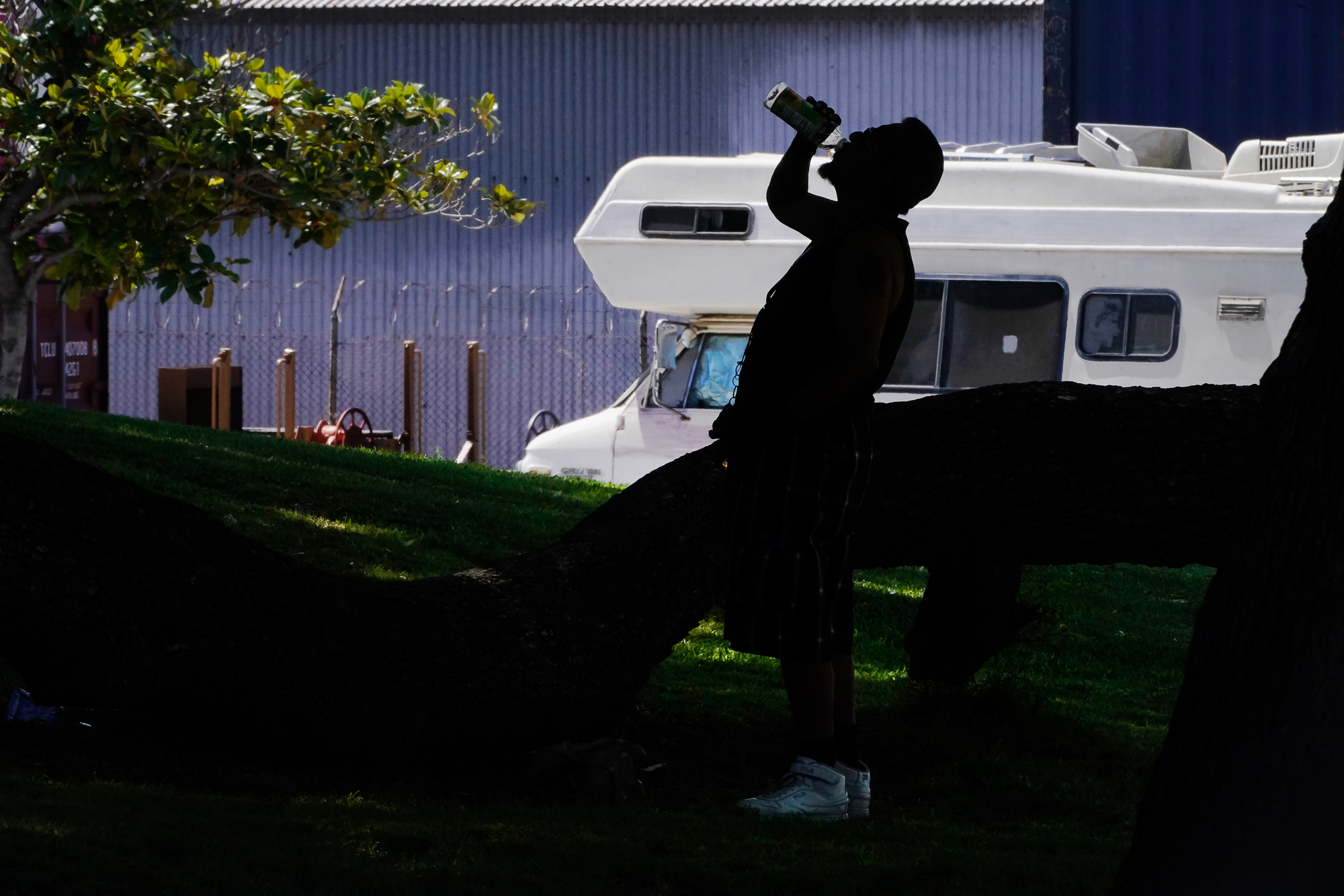 A man drinks water during a heat wave in Los Angeles on July 13, 2023. Photo by Damian Dovarganes via AP