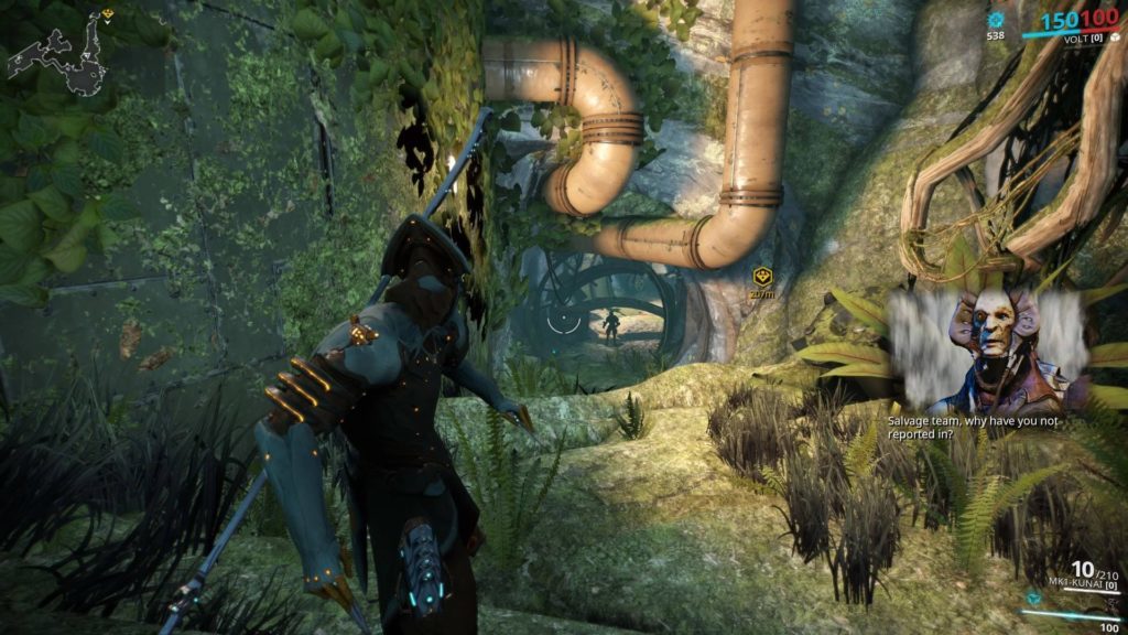 Volt Warframe looking at vine covered tunnel, picture-in-picture of Vor speaking to player.