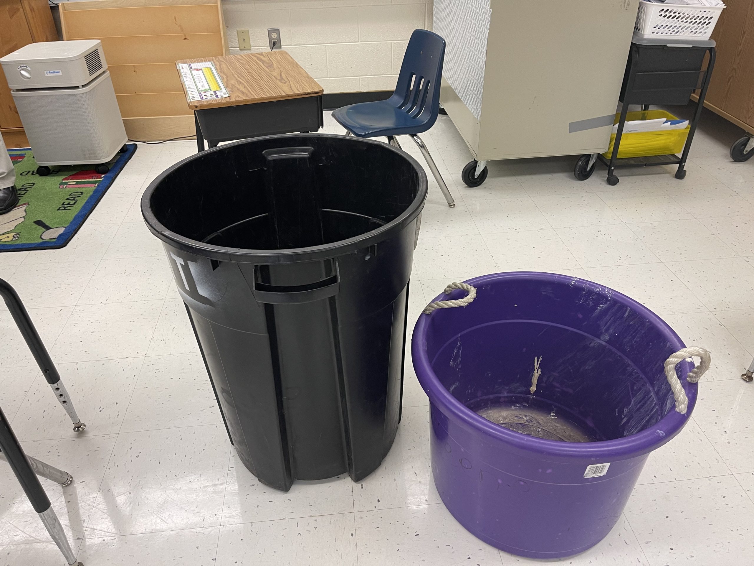 Buckets out to catch the rain at a school in Prince Edward County.