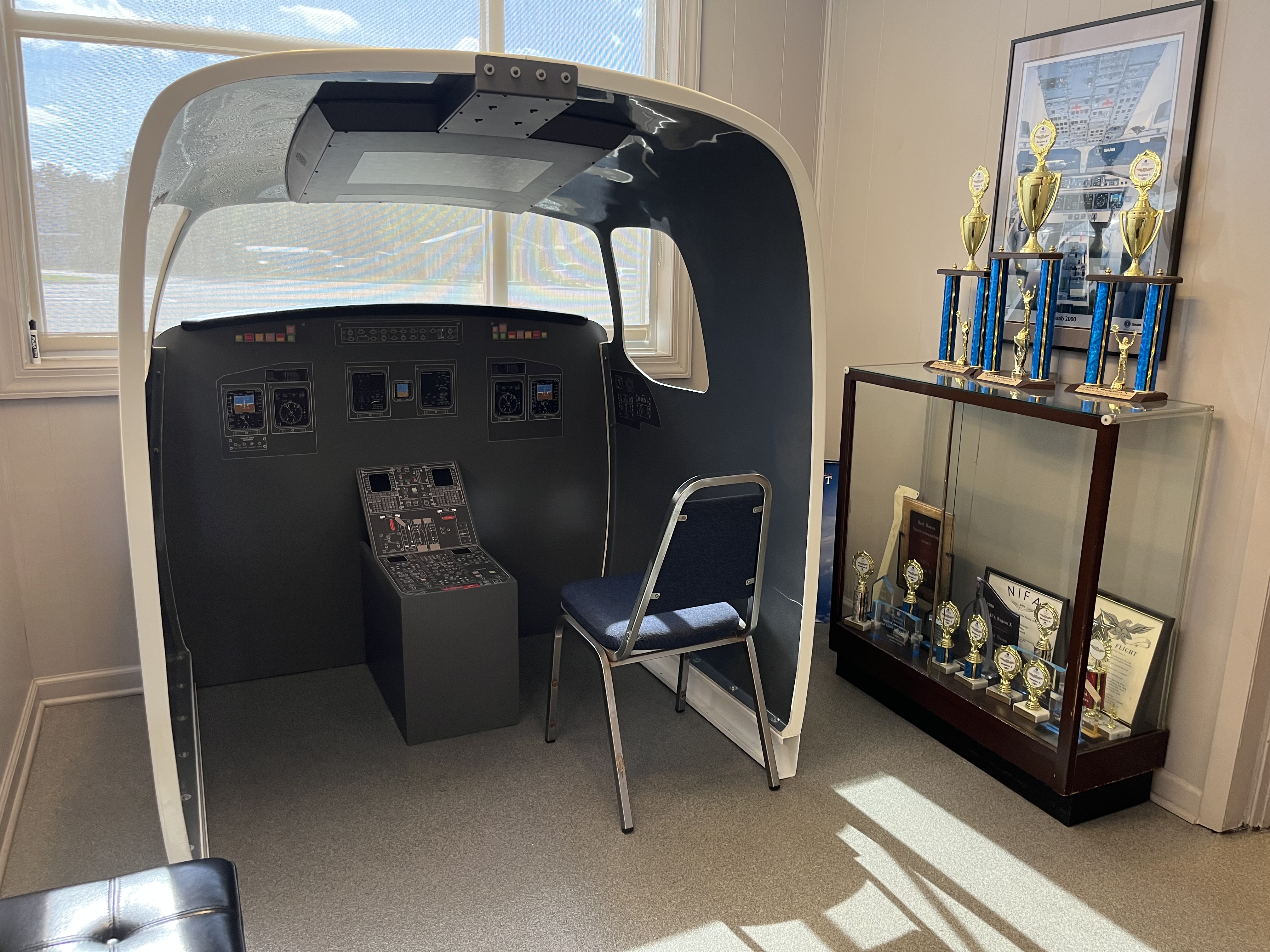 flying simulations inside the George J. Falk Flight Operations Center at the Danville Regional Airport.