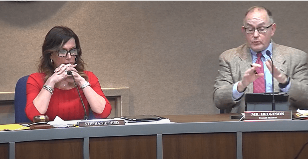 Lynchburg Mayor Stephanie Reed listens to council member Jeff Helgeson. Screenshot from video of meeting on Feb. 14, 2023.