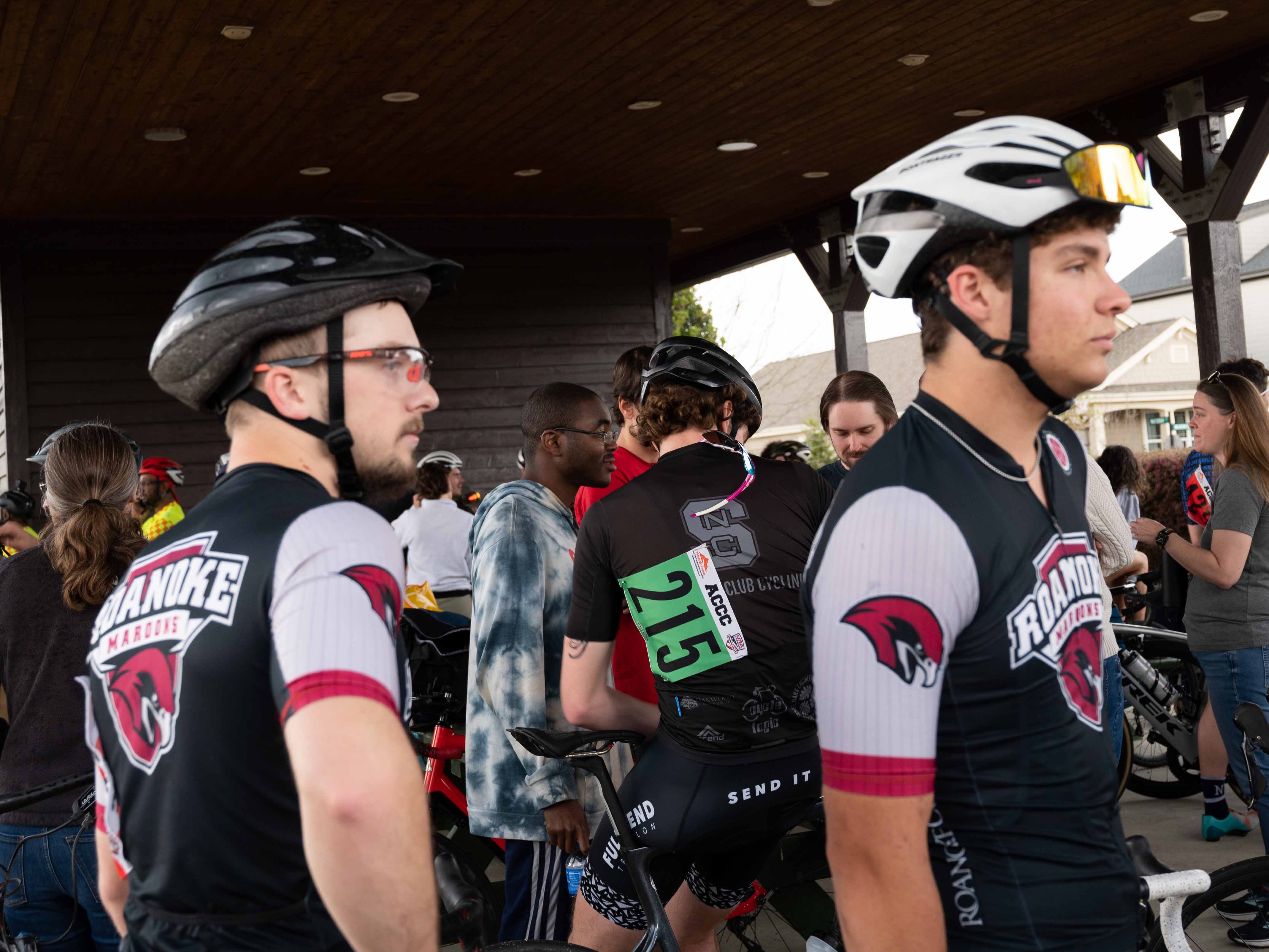 Roanoke College cyclists Rafe Johnson and Ben Cerkovnik (L to R) wait in the staging area before the criterium. Photo by Chad Braby