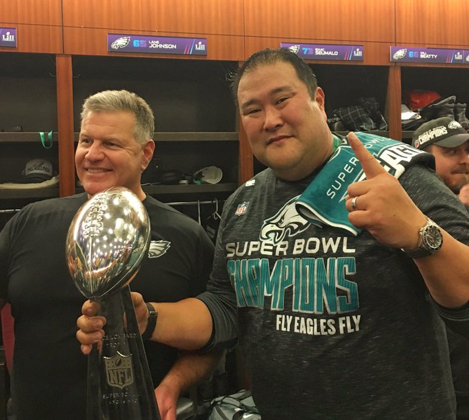 Eugene Chung, at right, when he was an assistant coach with the Philadelphia Eagles. Courtesy of Virginia Tech.