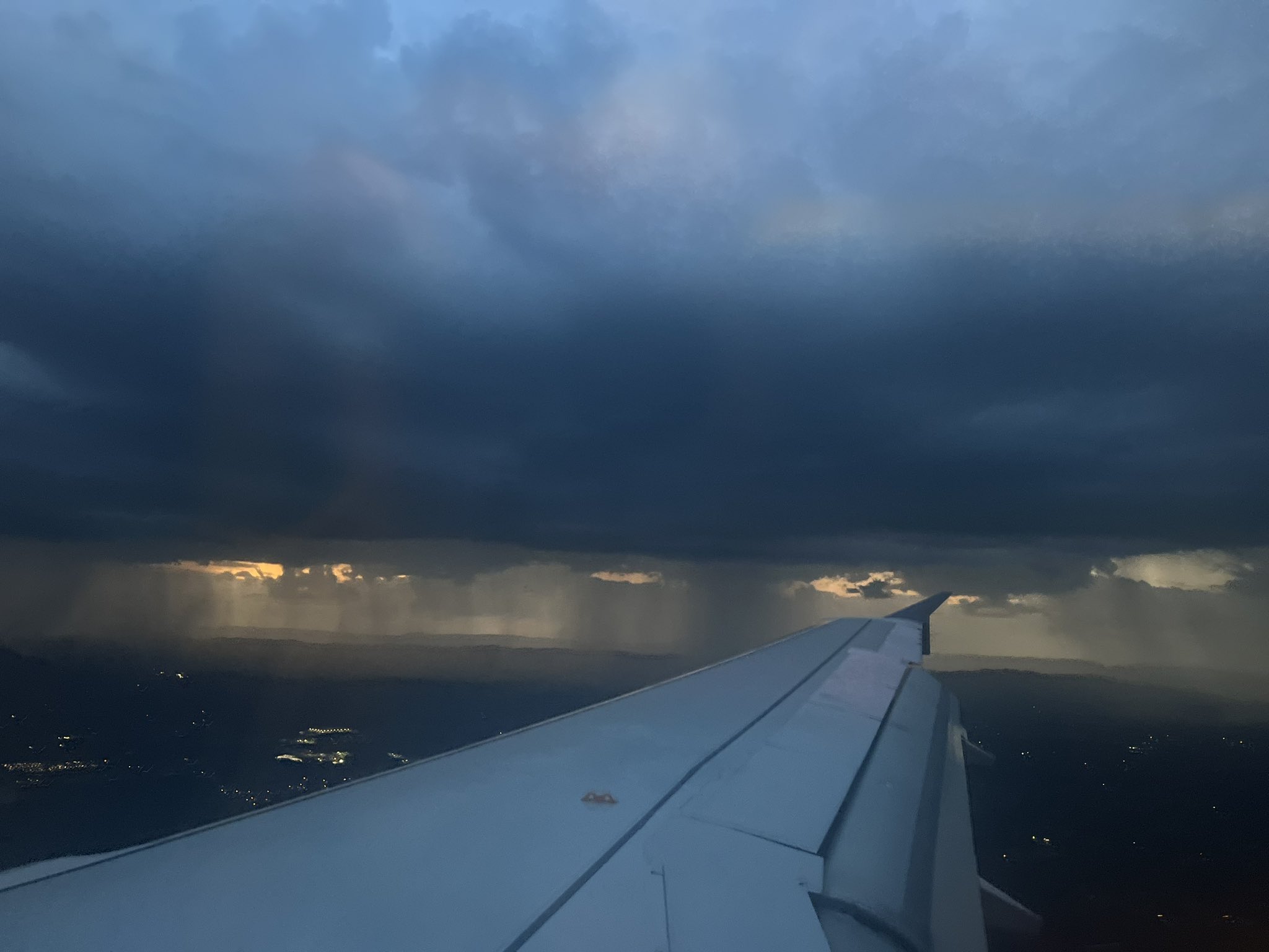 Storms develop west of Roanoke on Monday evening as seen from a plane landing at Roanoke-Blacksburg Regional Airport. While there was no derecho as happened 11 years ago Thursday, there were several reports of large hail and damaging wind in the Southwest and Southside Virginia coverage area of Cardinal News. Courtesy of Juan Espinoza.
