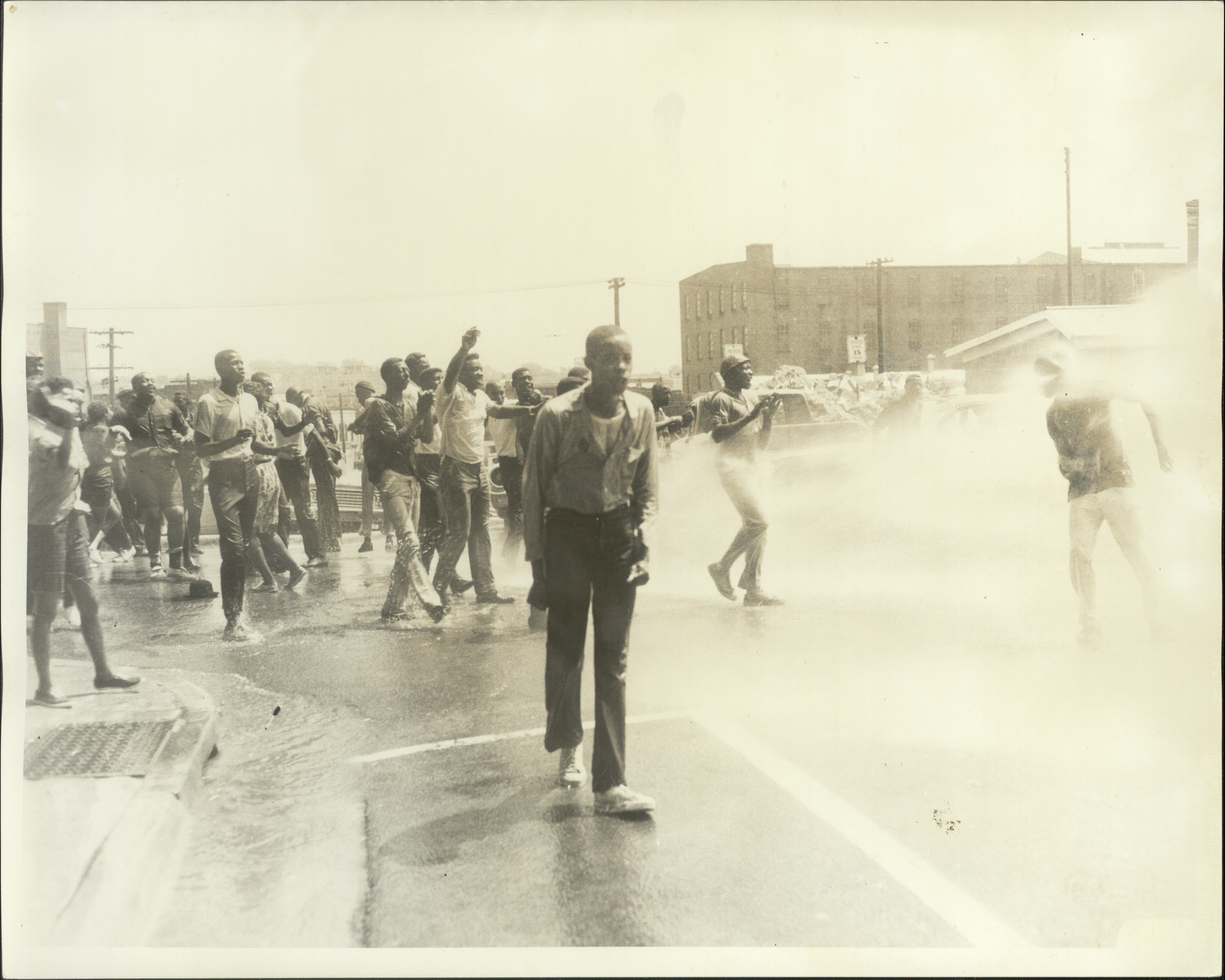 Danville police use fire hoses on protesters on a street on Bloody Monday