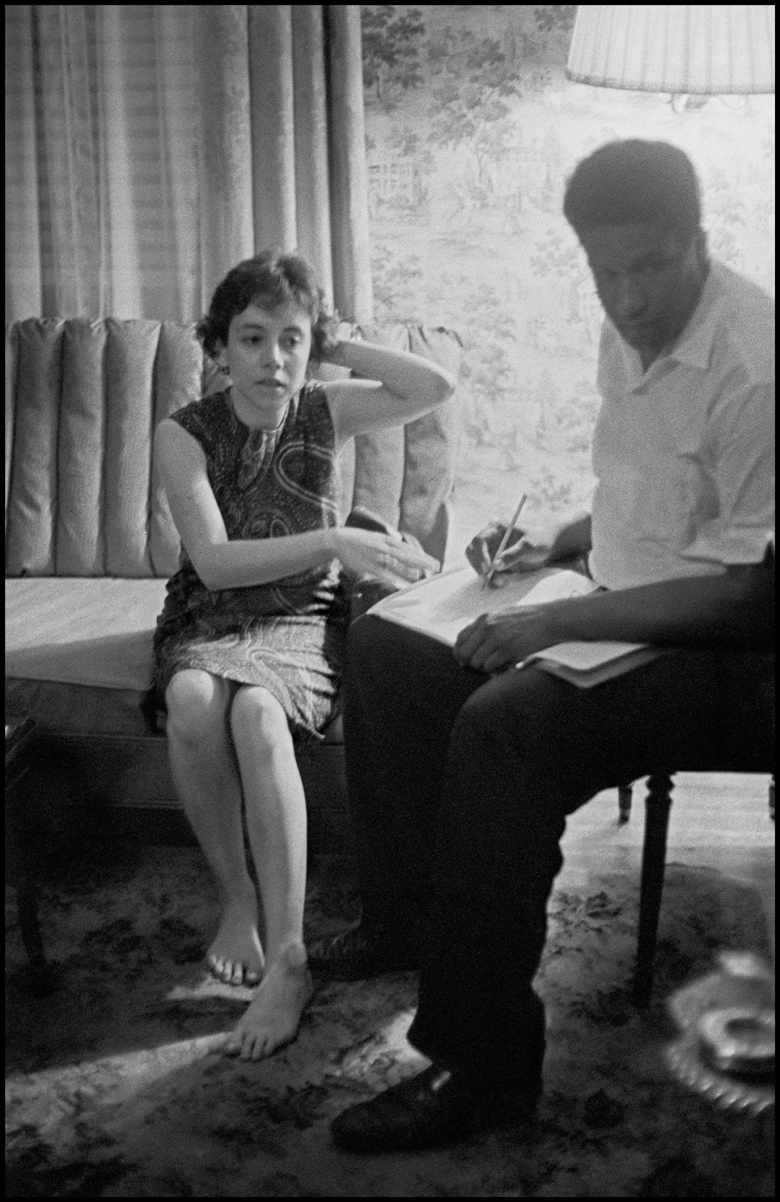 Dorothy Zellner giving a statement to SNCC secretary James Forman
