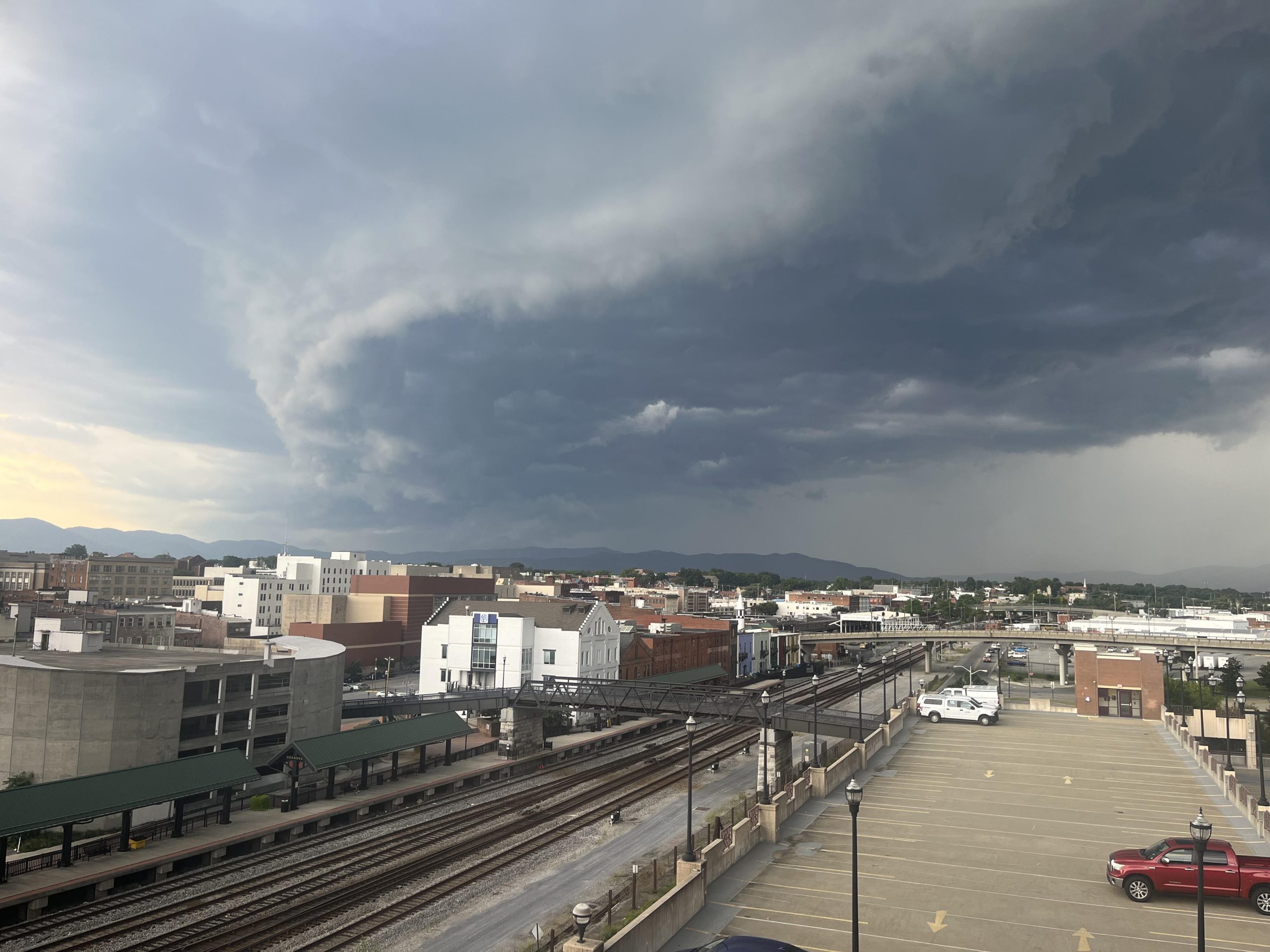 The shelf cloud of an advancing squall line rolls over downtown Roanoke on Friday, July 28. Photo by Lisa Rowan.