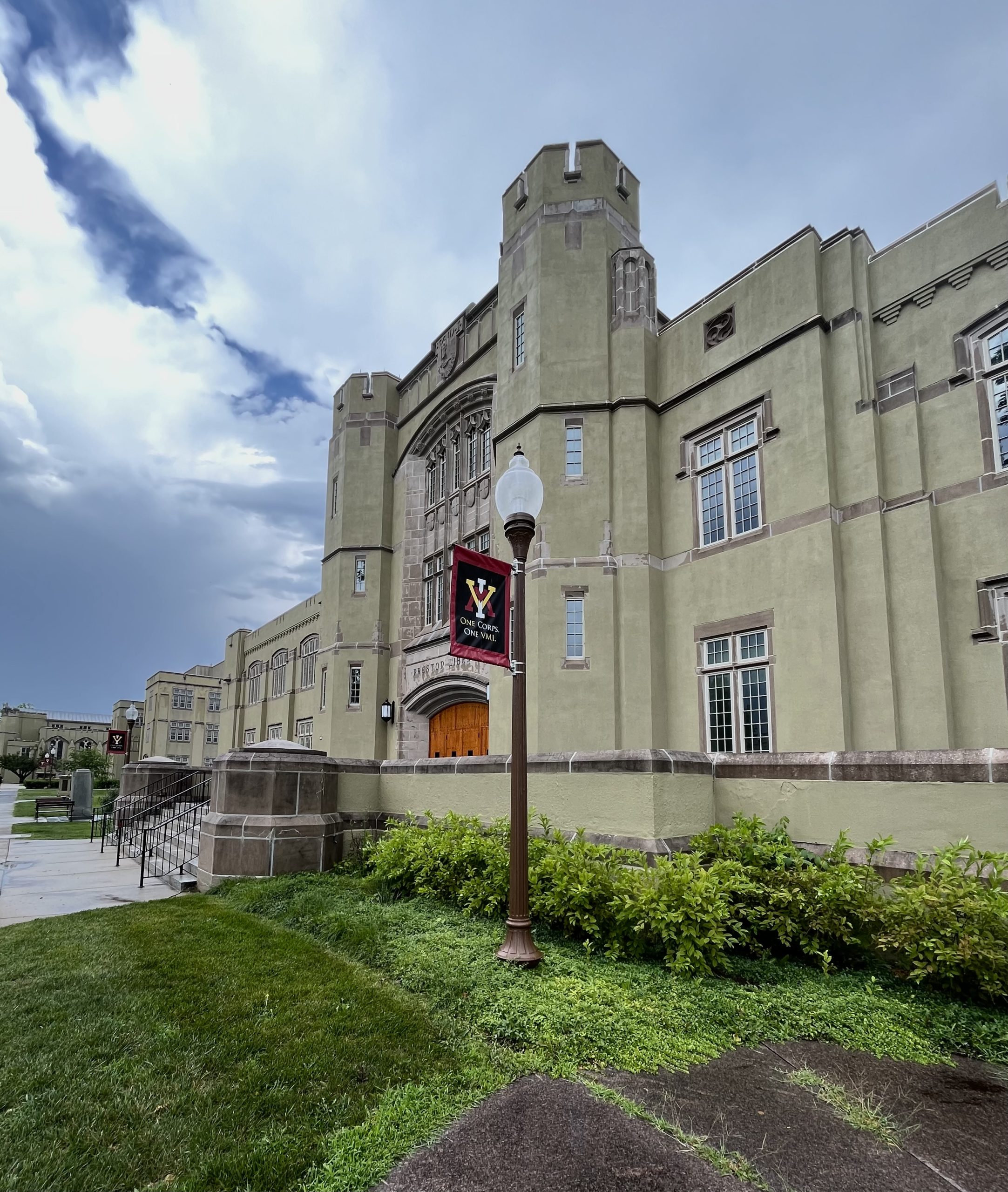 The exterior of Preston Library at VMI, a beige brick two-story building.
