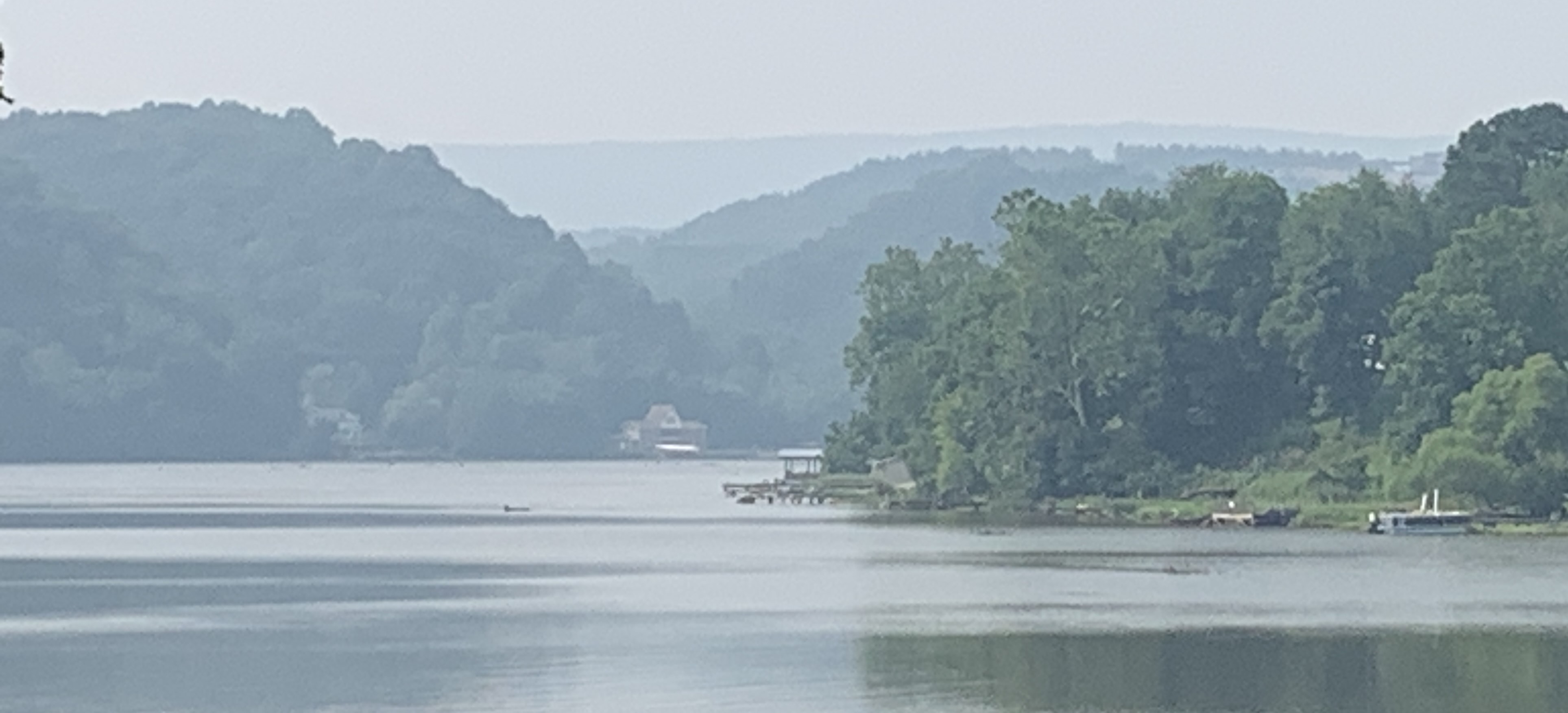 Smoky haze obscures hills as seen along the New River Trail in Pulaski County on Monday, July 17. Photo by Kevin Myatt
