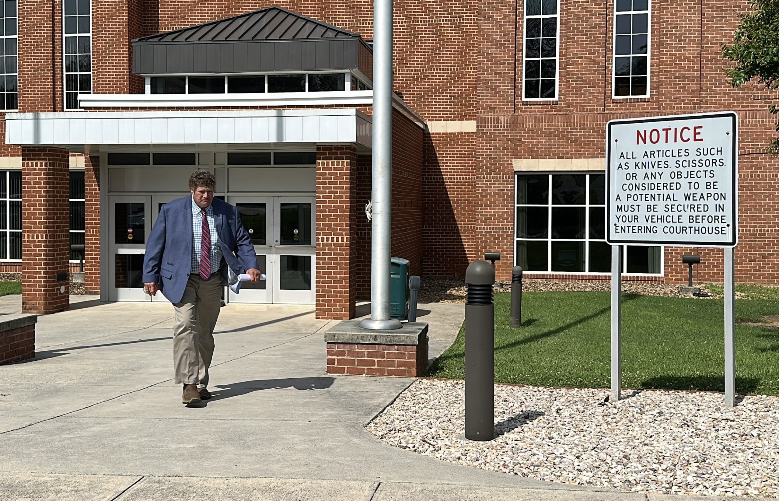 Del. Matt Fariss leaves the Campbell County courthouse ion Tuesday after a judge certified his two felony charges to the grand jury. Photo by Markus Schmidt.