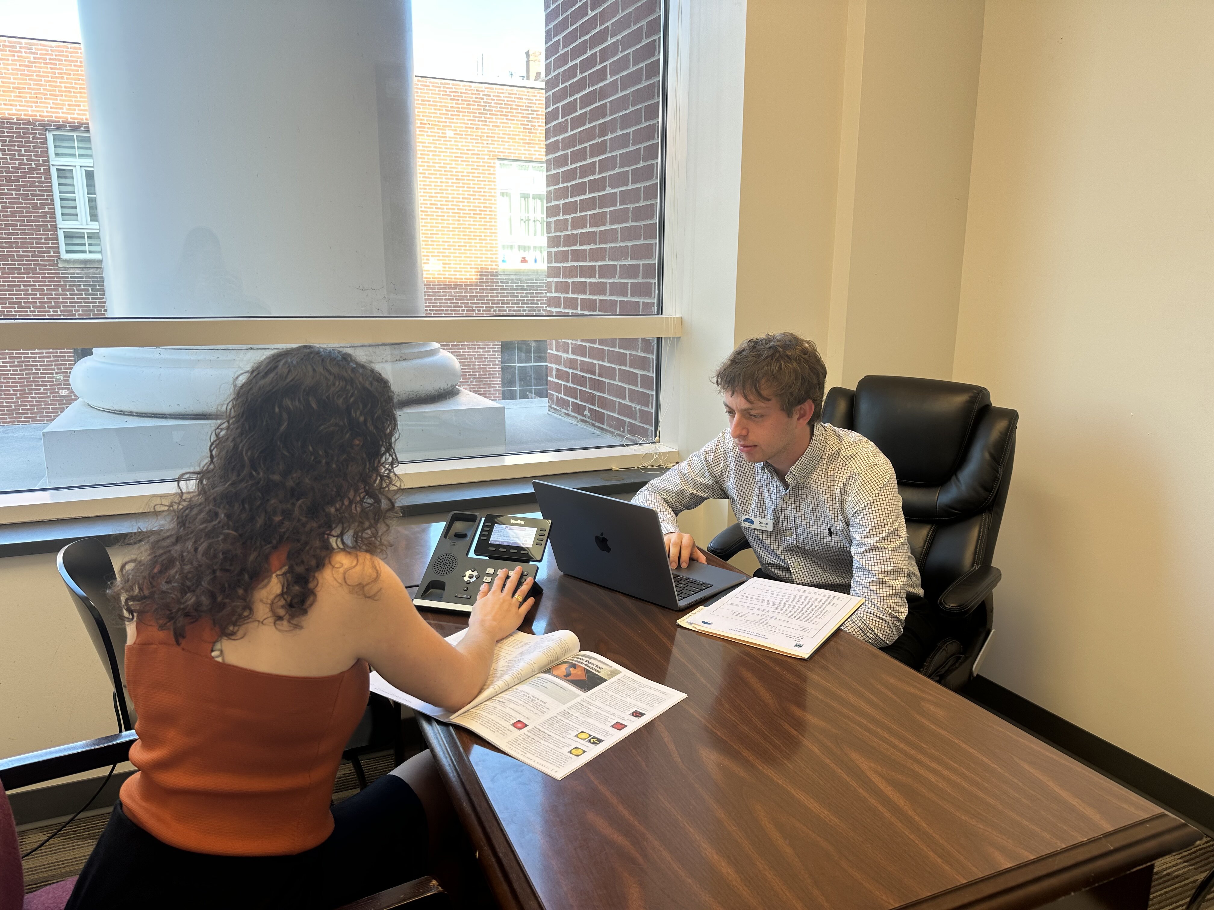 W&L student advocates Daniel Reiter and Georgia Bernbaum work a clinic shift at the Lexington/Rockbridge General District Court.  (Photo credit: Lawson Brantley)