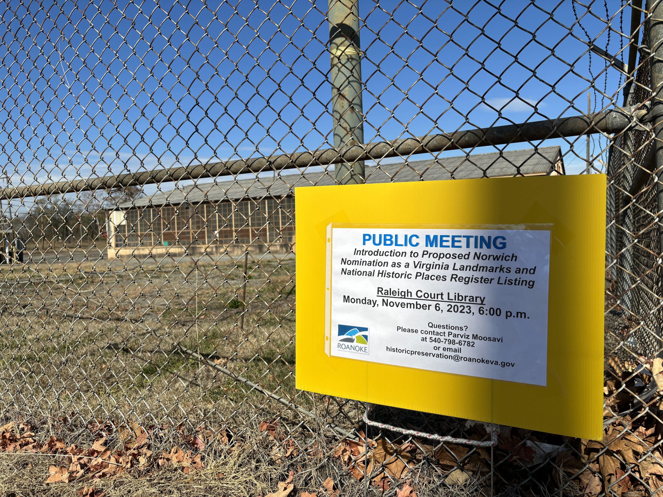 A sign outside an industrial property advertises the public meeting. Photo by Emily Hemphill.