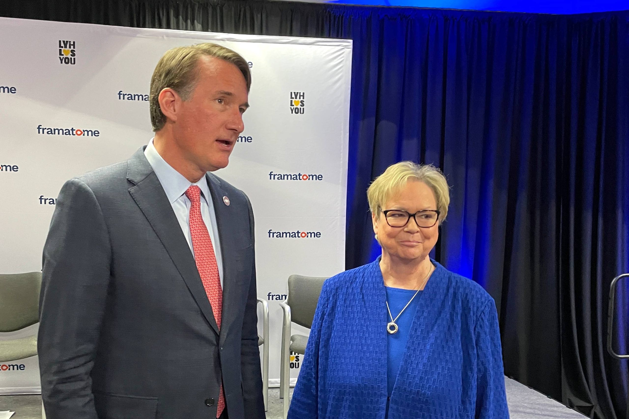 Gov. Glenn Youngkin (left) and Framatome North America CEO Kathy Williams chat before speaking with the media on Thursday at Framatome in Lynchburg. Photo by Matt Busse.