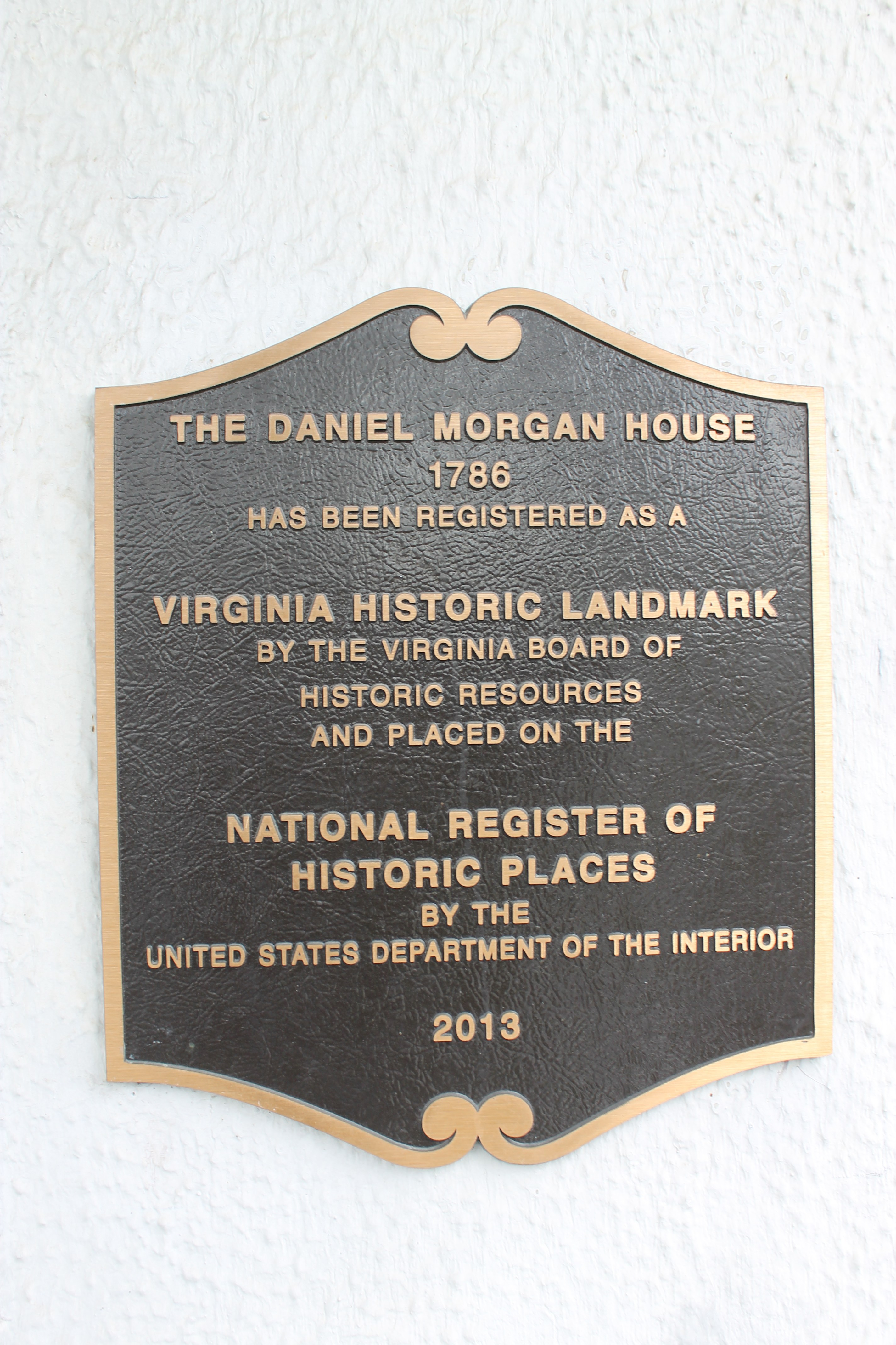 1. A plaque beside the front door of the Daniel Morgan House in Winchester, noting that thehome is a Virginia Historic Landmark and is listed on the National Register of Historic Places.